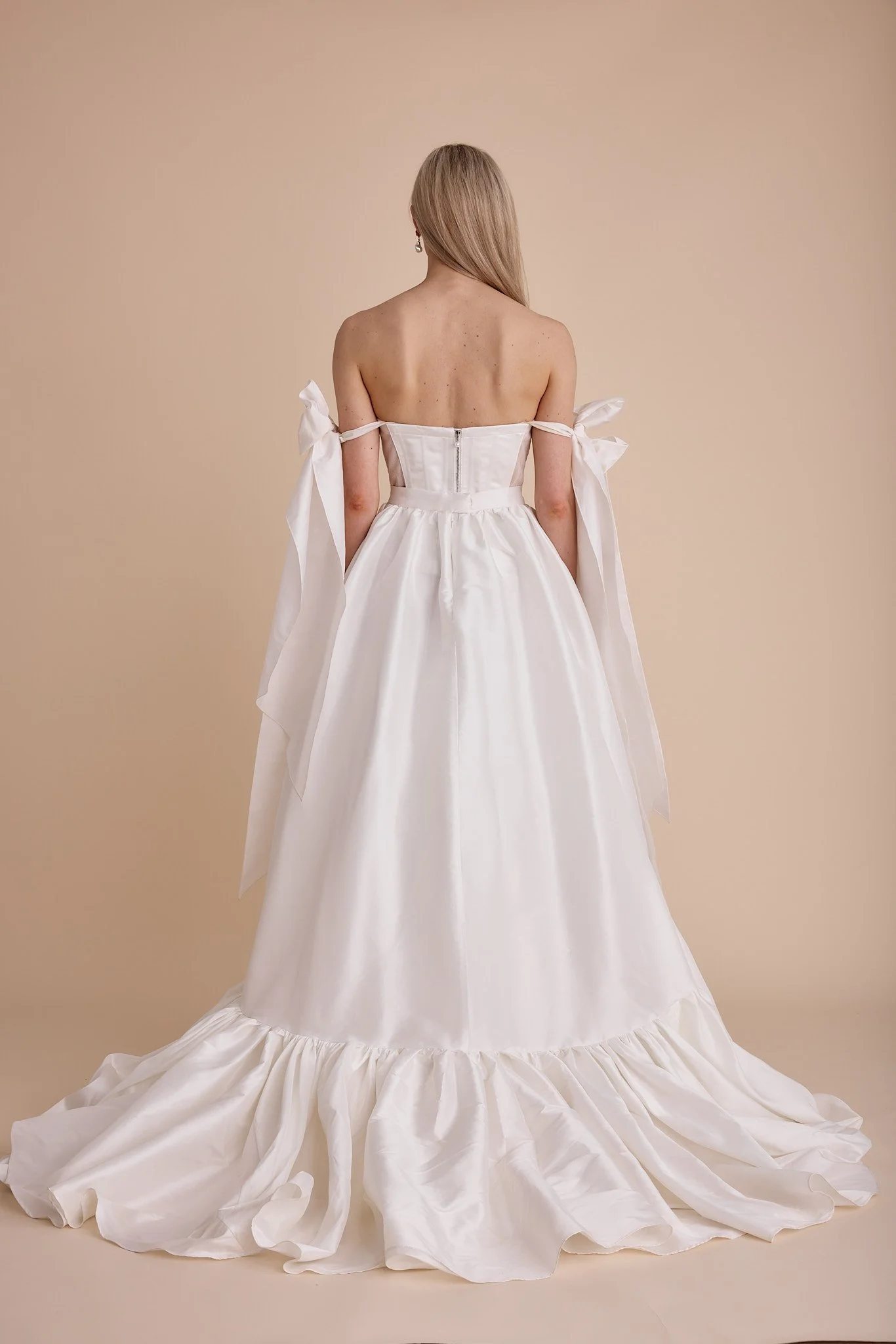 The back of a custom wedding dress by Swans Bridal.