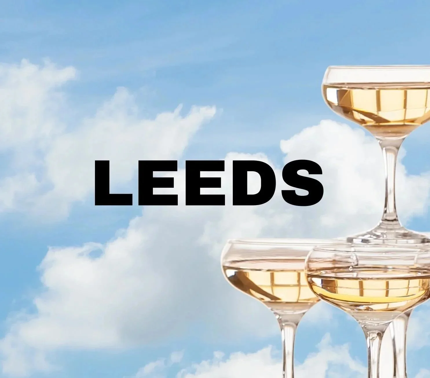 A champagne tower on a cloudy sky