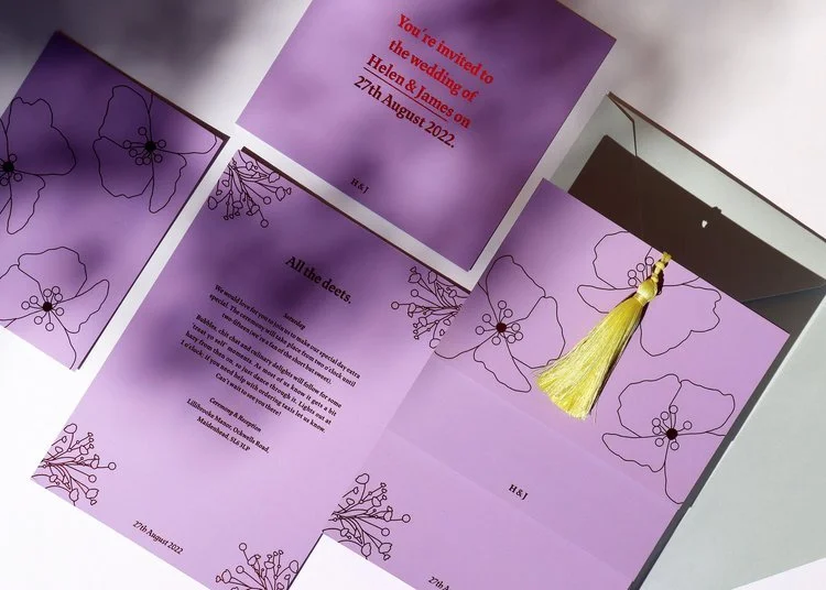 Modern minimalist wedding invitation suite by Pelirocco Design. Featuring bold typography, lilac tones, and delicate floral line art with a statement yellow tassel, this contemporary stationery design is perfect for stylish couples seeking elegant, d