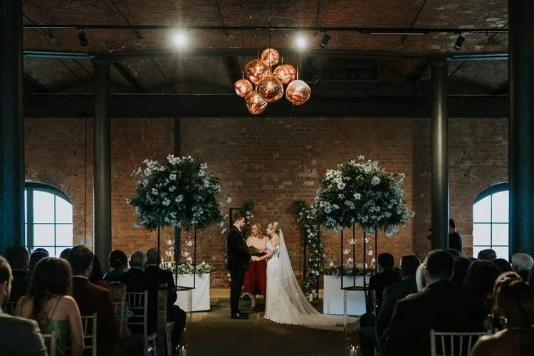 The Joy Celebrant conducting a beautiful wedding ceremony in a unique venue.