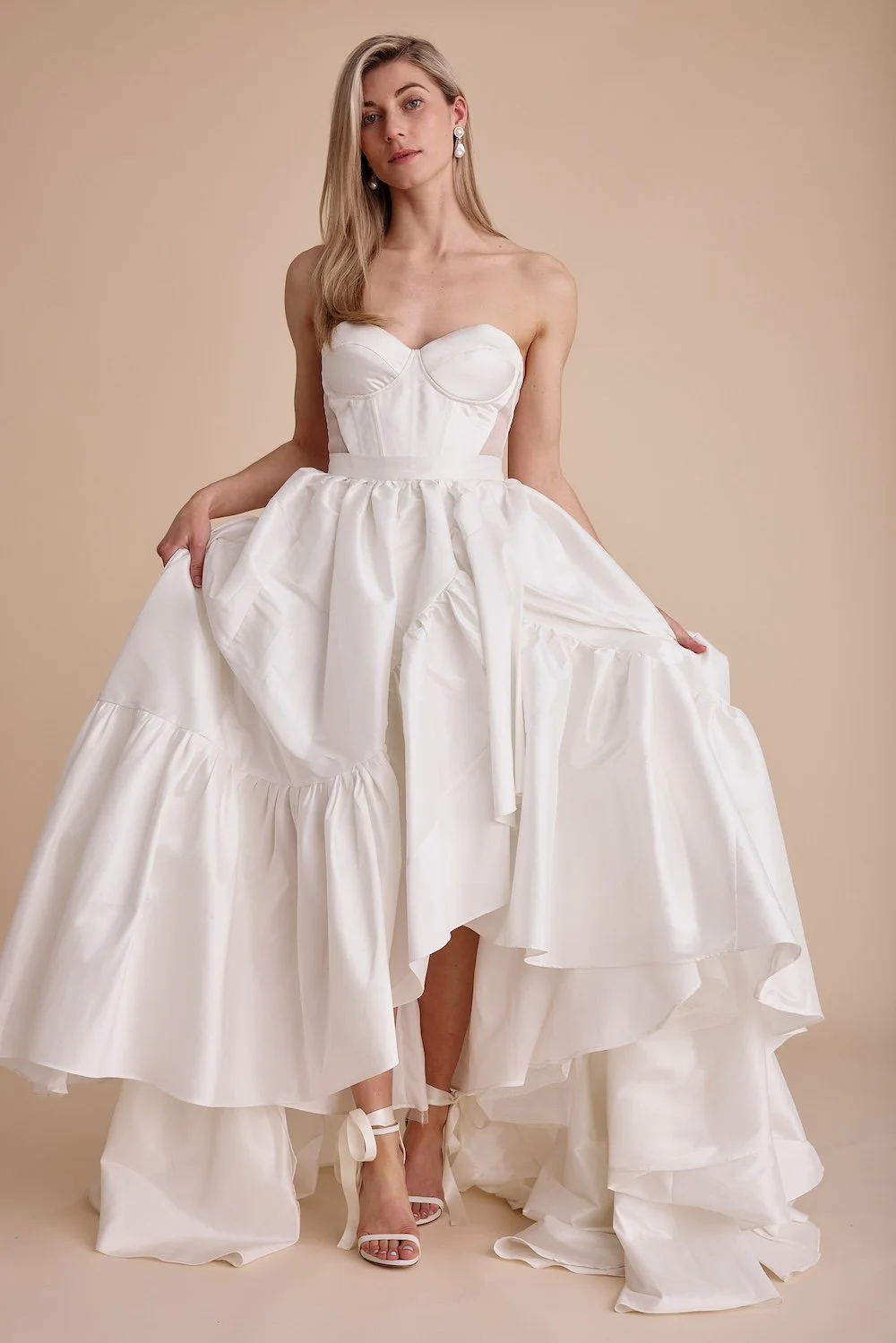 A modern wedding dress that has been upcycled by Swans Bridal