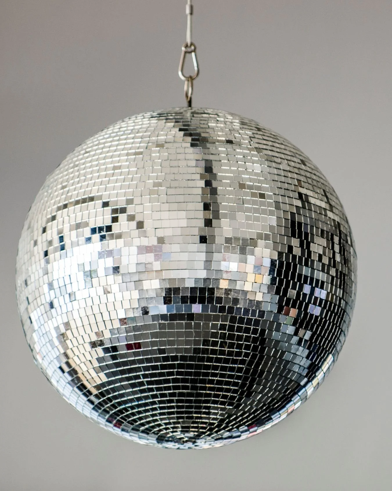A giant disco ball hanging from the ceiling.