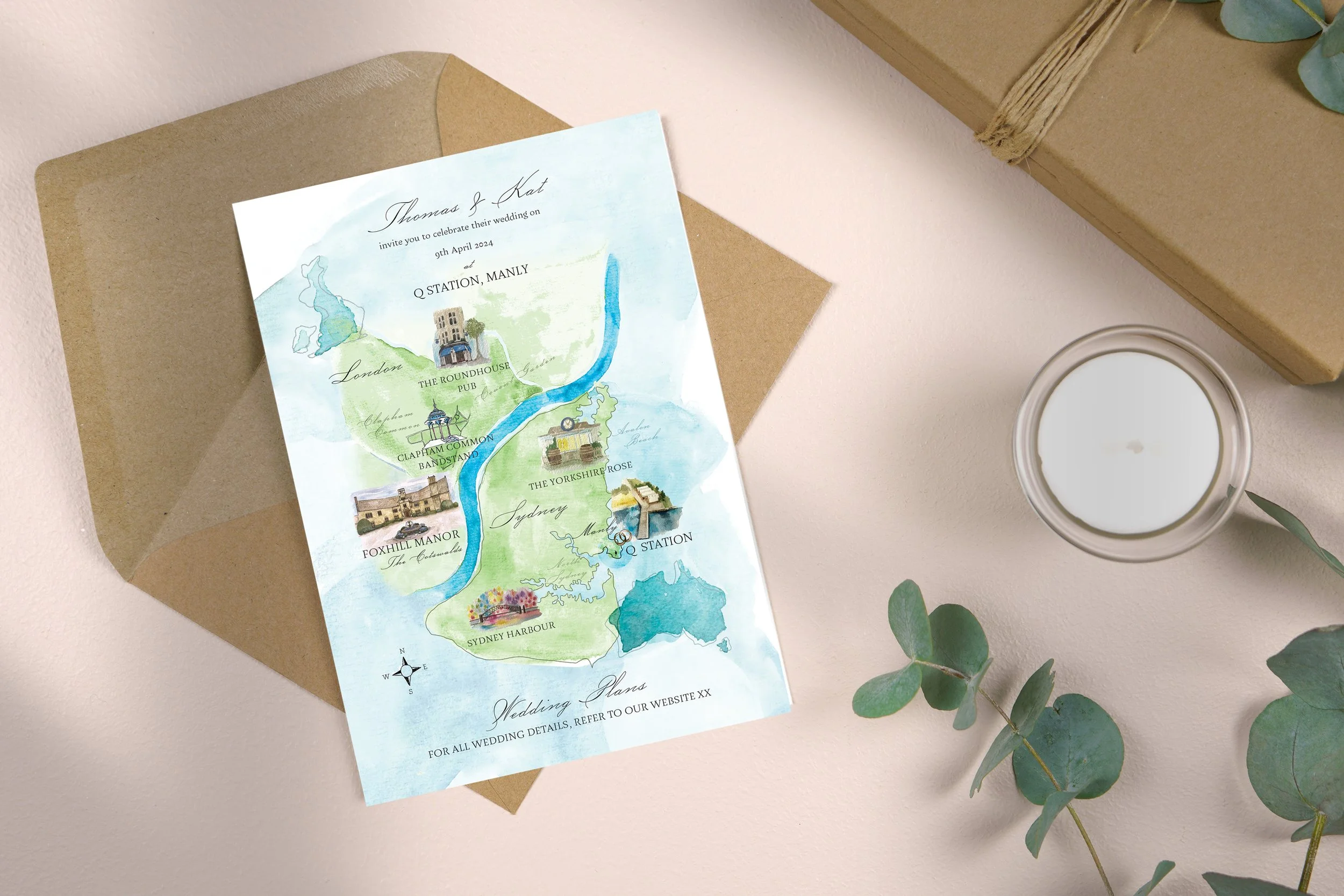 A beautifully illustrated destination wedding invitation by Feather & Ink Stationery featuring a bespoke watercolour map linking London to Sydney with hand painted landmarks and venues printed on smooth card and styled with a kraft envelope, candle a