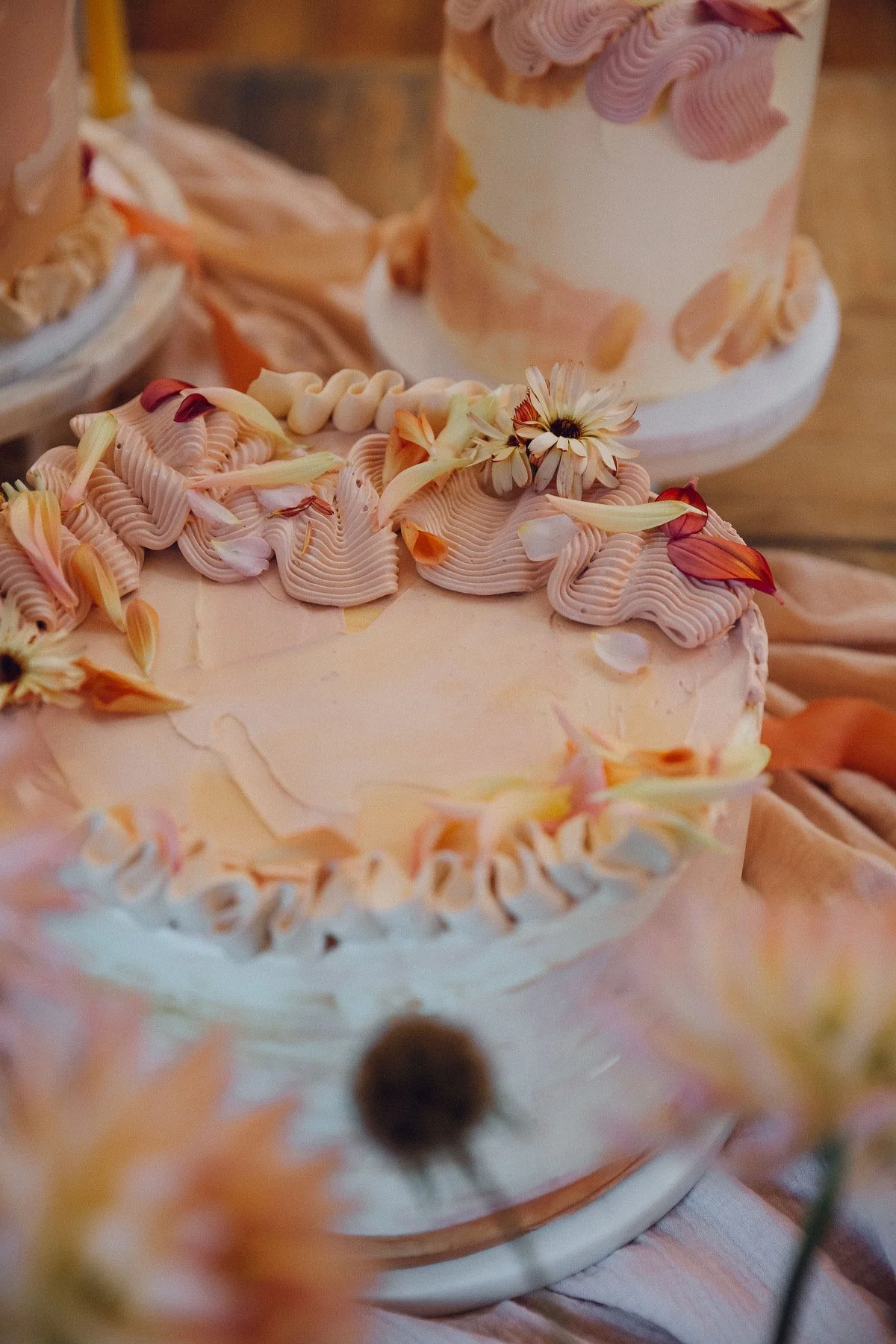 A professional and srtictic shot of a wedding cake by Sarah and Cake, taken by India Hobson. 