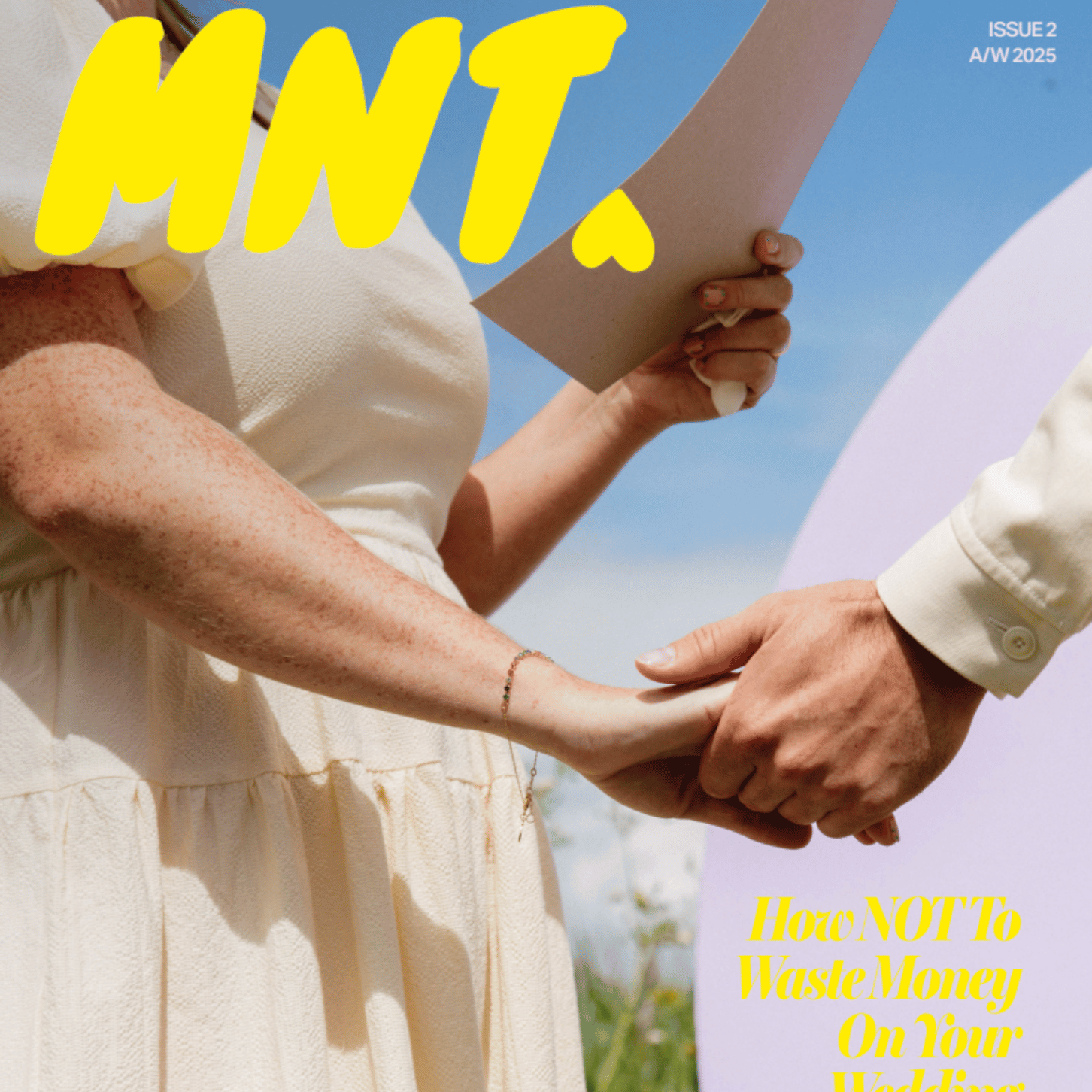 The cover of MNT Magazine Issue 3 with a close up of a modern couple holding hands and a yellow masthead.