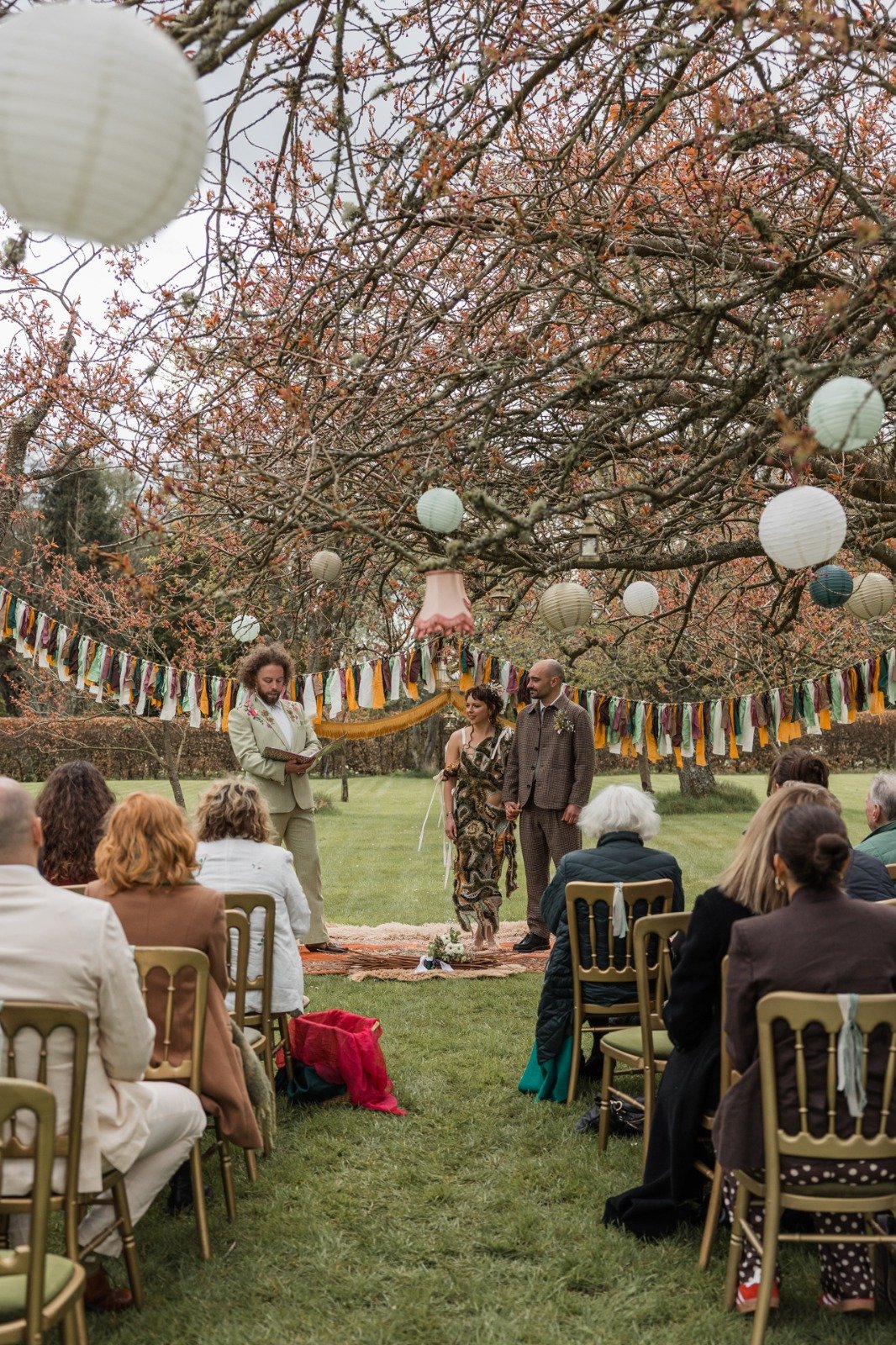A vibrant, outdoor wedding ceremony led by celebrant Lonan Jenkins, featuring colourful festival styling, heartfelt moments and happy guests. This gallery captures relaxed, non-traditional weddings with live music, creative rituals and authentic cele