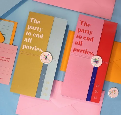Playful, modern wedding invitations by Pelirocco Design. Featuring bold colour blocking in mustard, pink, and red with contemporary typography and wax seal detailing, this vibrant stationery set perfectly captures a fun, design-led celebration - idea