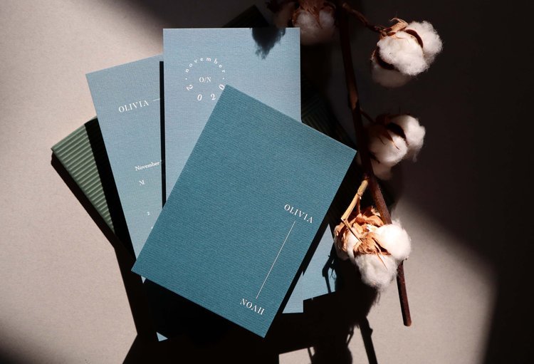 Minimalist teal wedding stationery by Pelirocco Design. Featuring sleek typography, modern layout, and textured card stock, this elegant “Save the Date” design exudes understated sophistication - ideal for contemporary couples seeking stylish, design