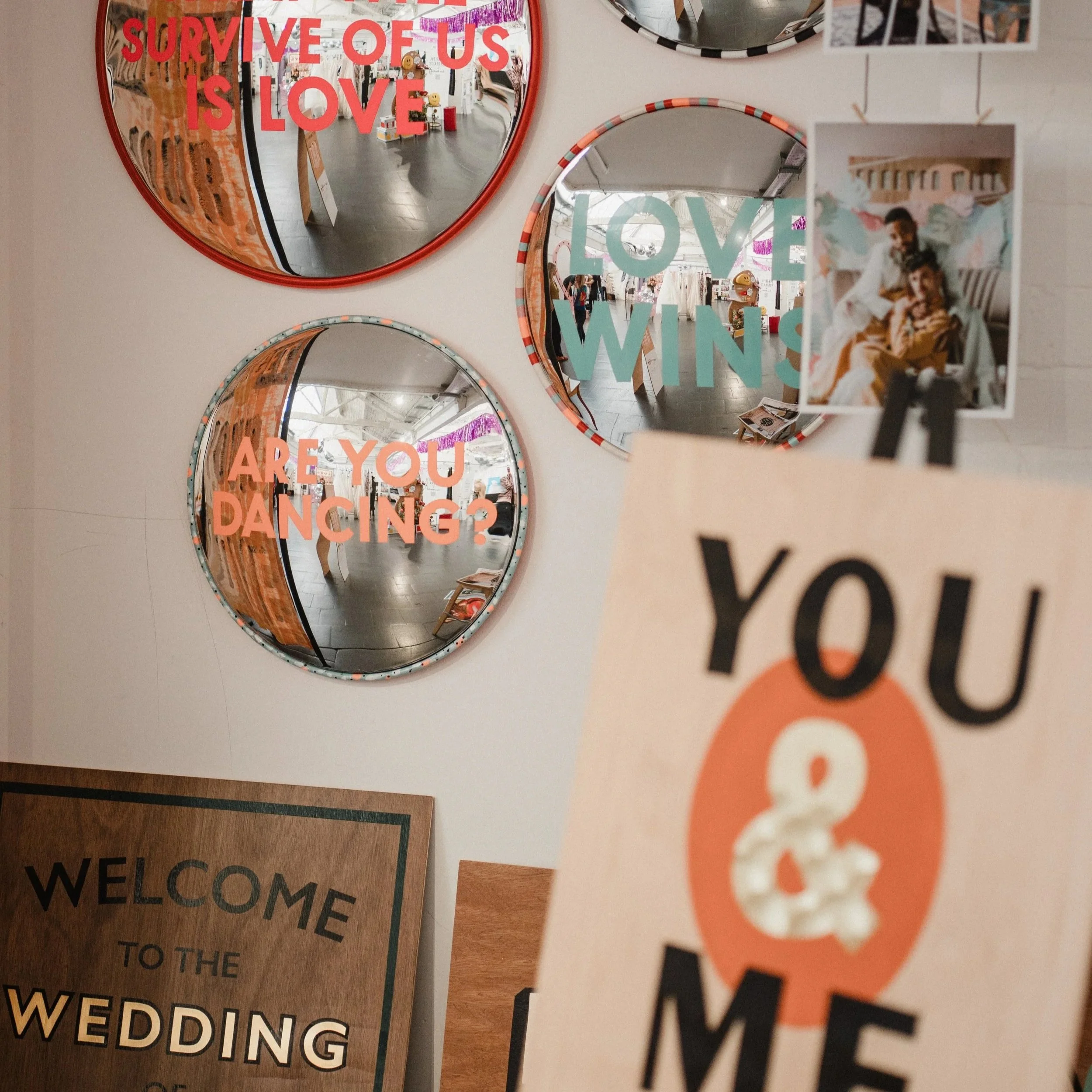 Hand painted wedding signage and mirrors.