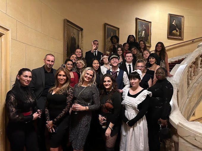 Moonstone Murders team of professional actors and performers dressed in character, delivering immersive mystery entertainment for weddings and events.