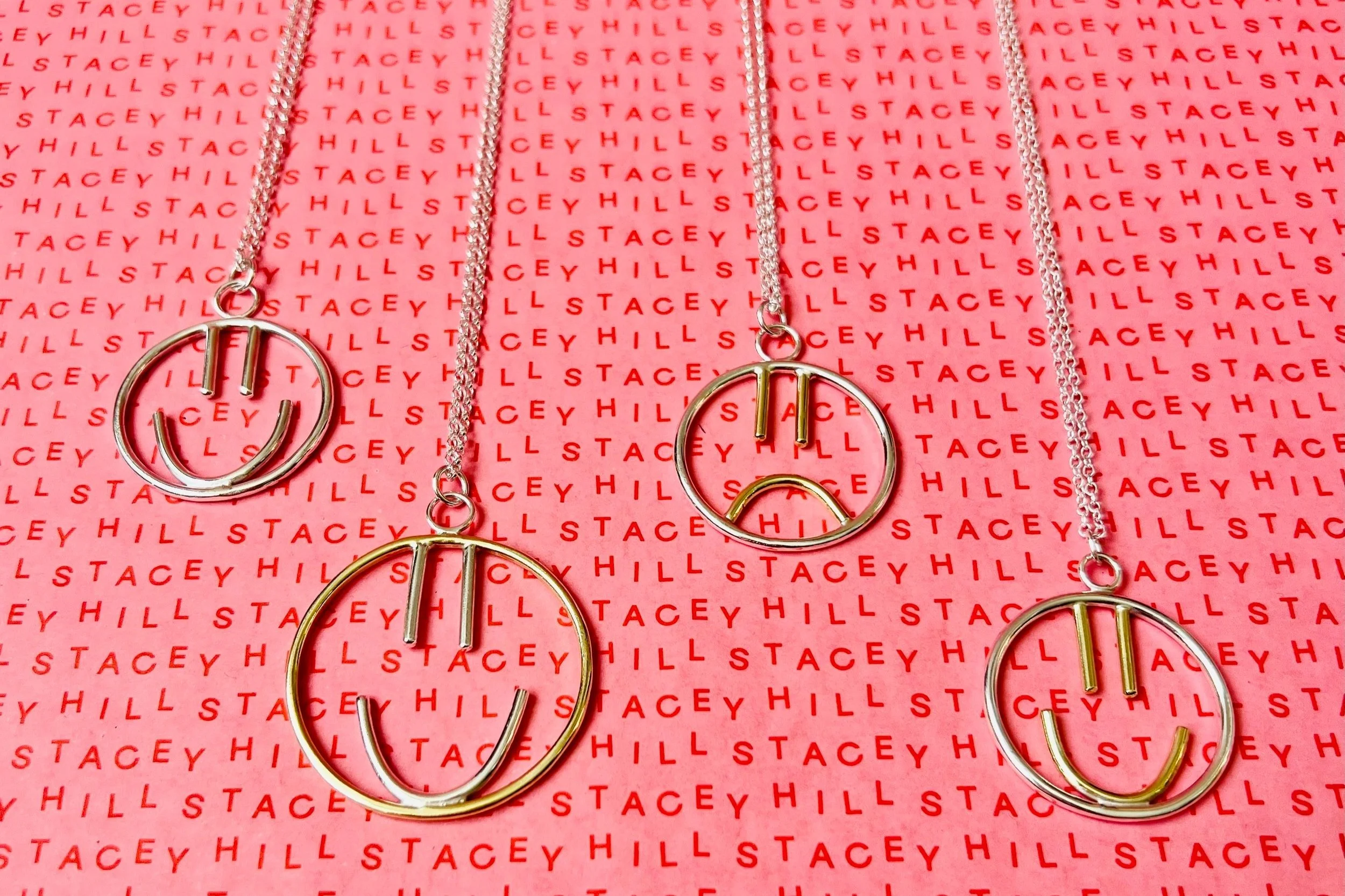 Stacey Hill Smiley necklaces.