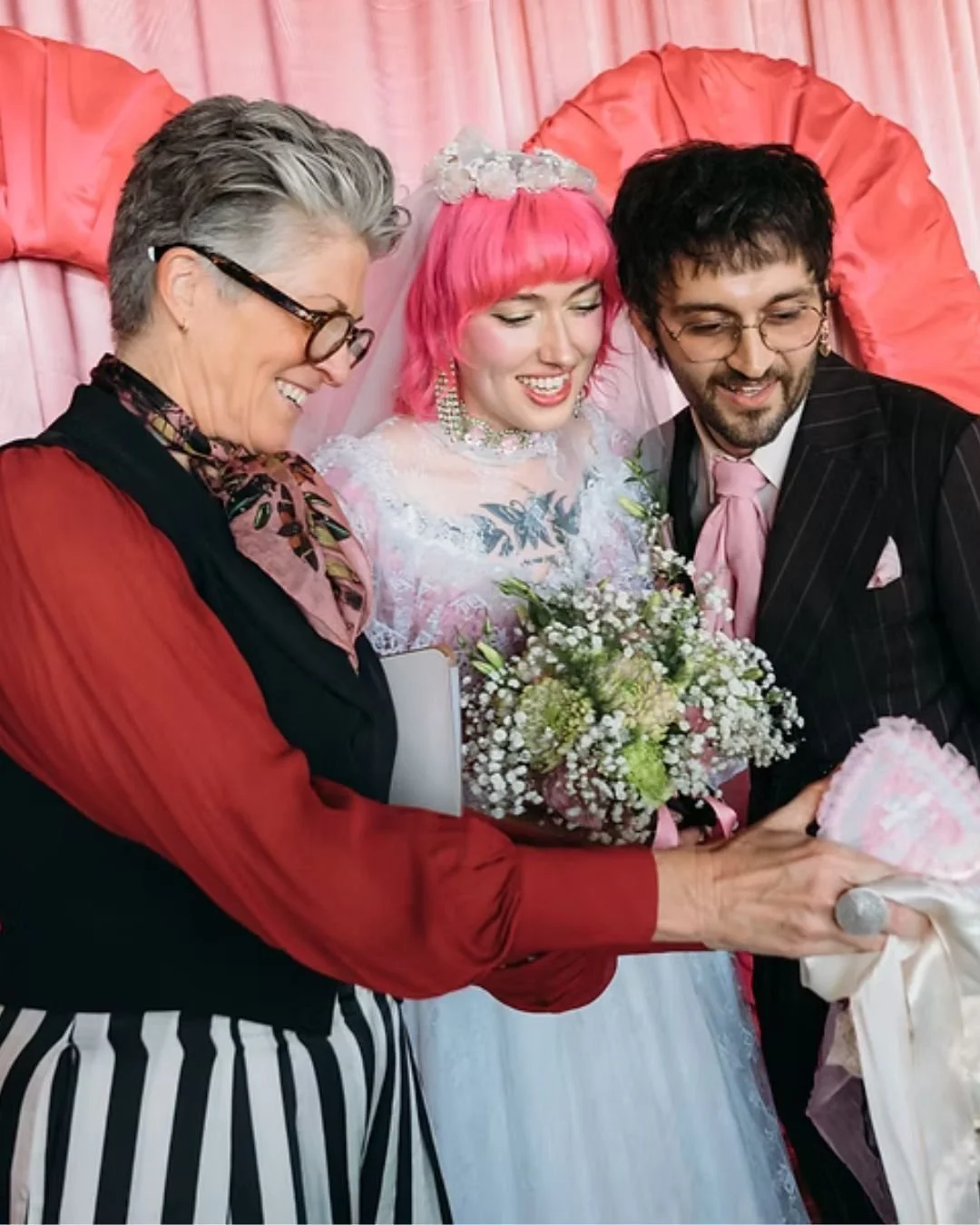 A modern bride and groom with their wedding celebrant, Arabella Wilde. Photo by Joanna Bongard.