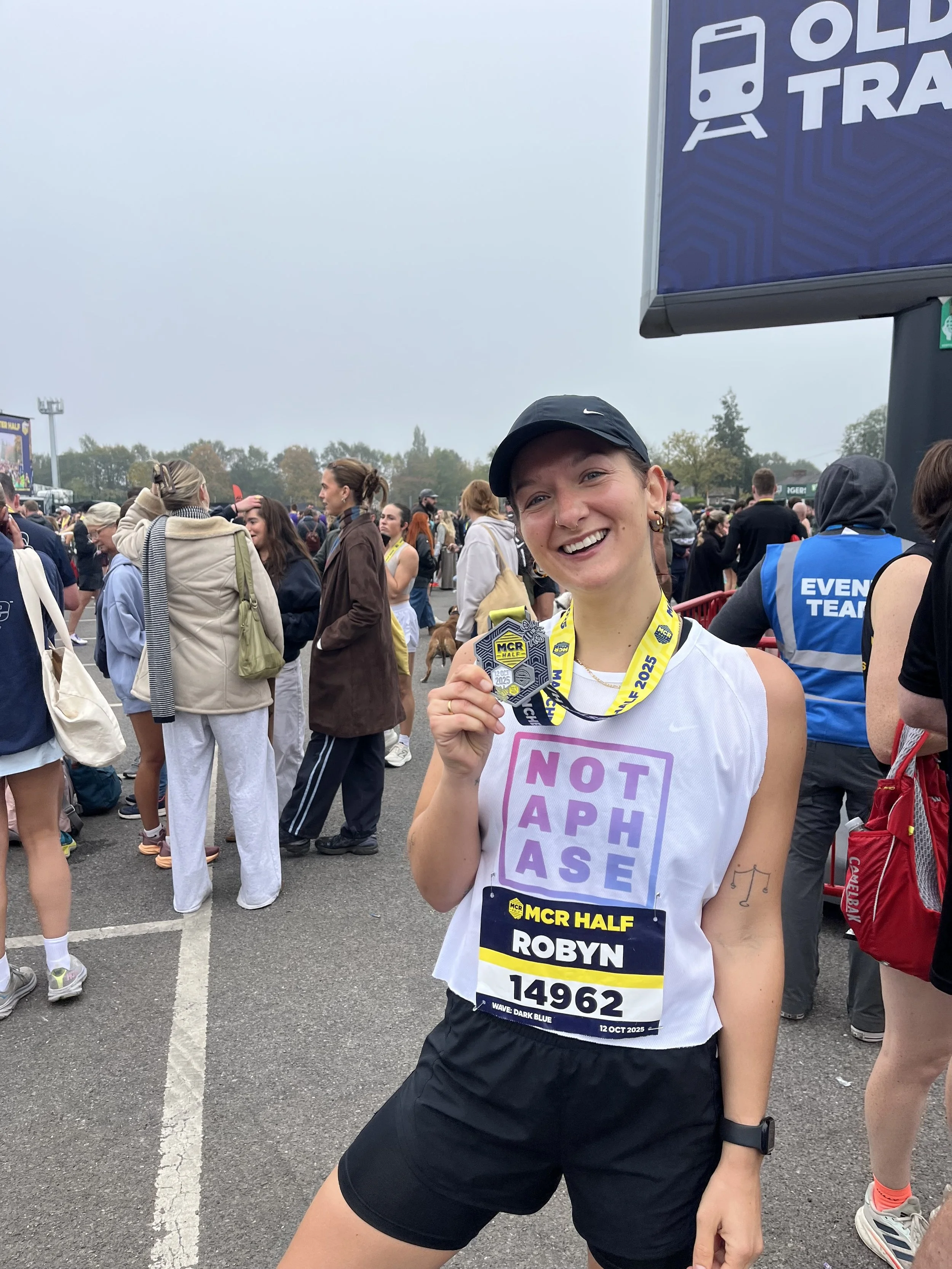 Robyn Smith, Wedding Celebrant, proudly holds her medal after completing the Manchester Half Marathon, celebrating strength, resilience and community spirit. This energetic image reflects the passion and personality Robyn brings to every modern weddi