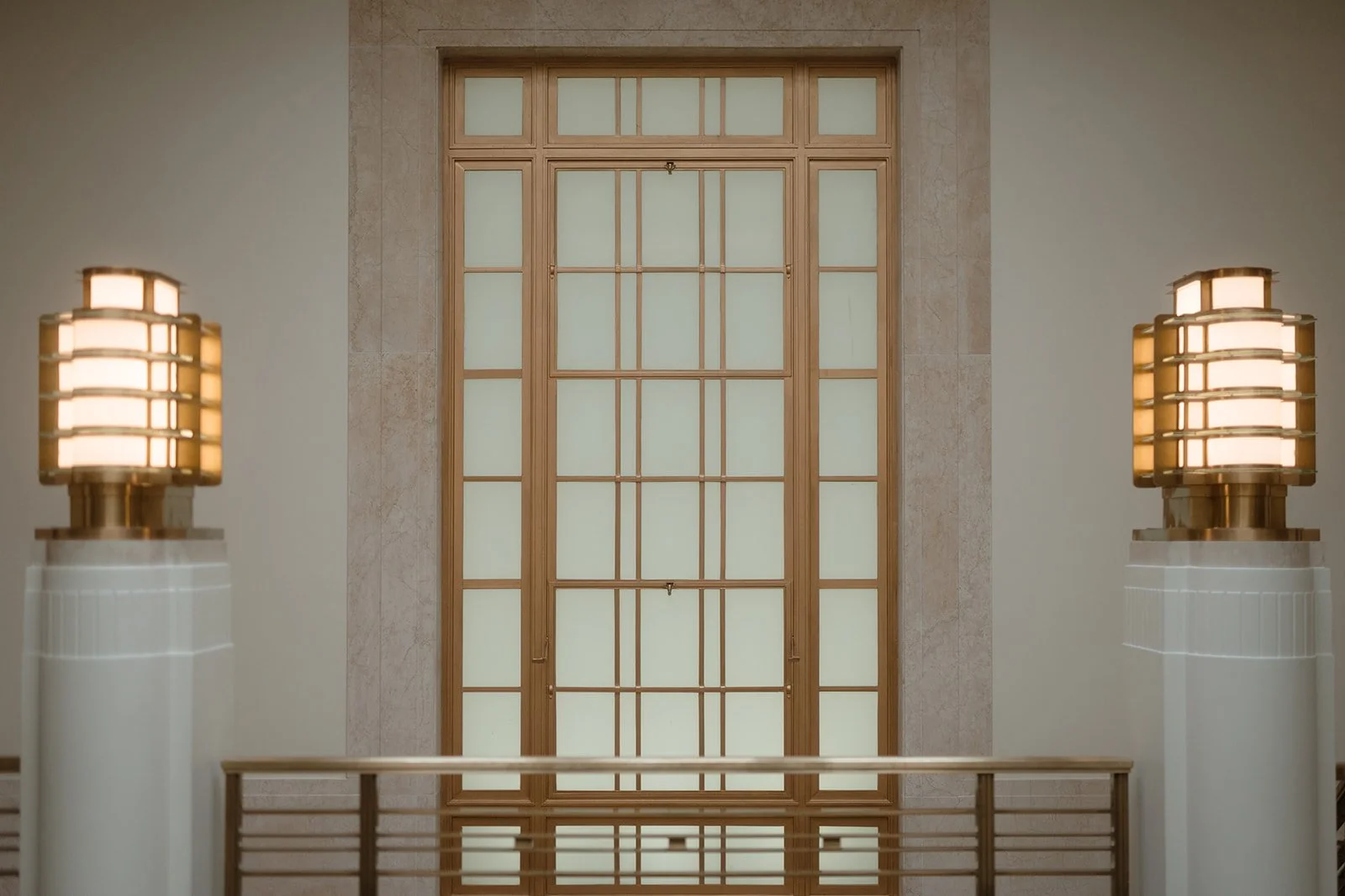 A door framed by lights in Hackney Town Hall.