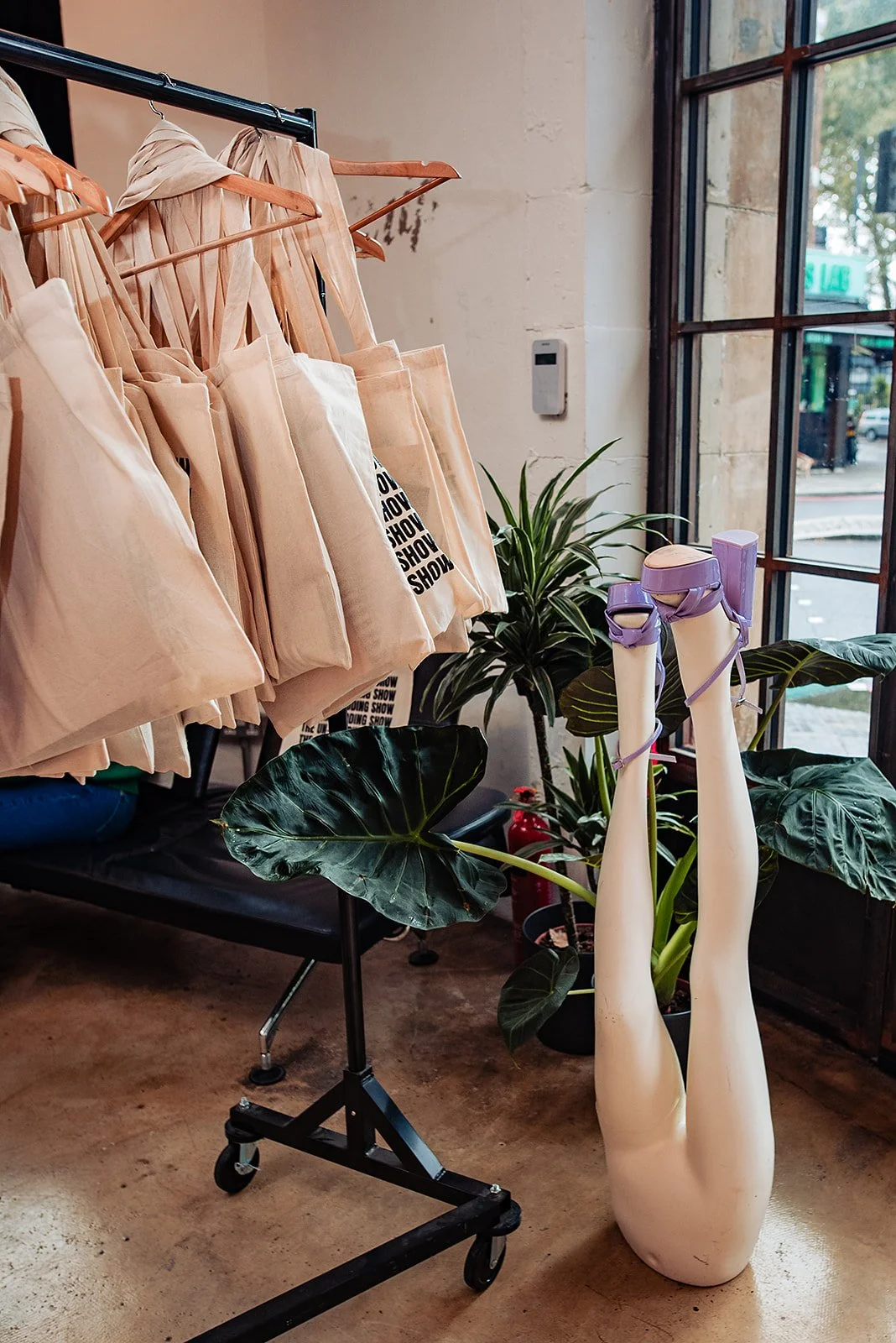 Mannequin legs i n the air at The Un-Weddng Show goody bag rail.
