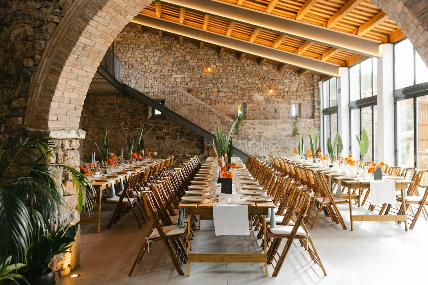 A modern wedding set up inside, This Must Be The Place, one of Barcelona's most enchanted destination wedding venues.