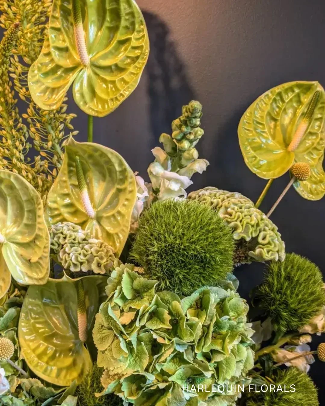 Luscious green wedding florals by Harlequin Florals.
