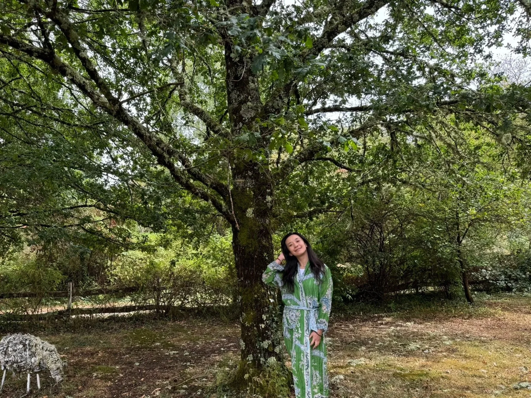 Li Lamb offering hypnotherapy and NLP in Ilkley, photographed in a tranquil woodland area that reflects her grounding, therapeutic style