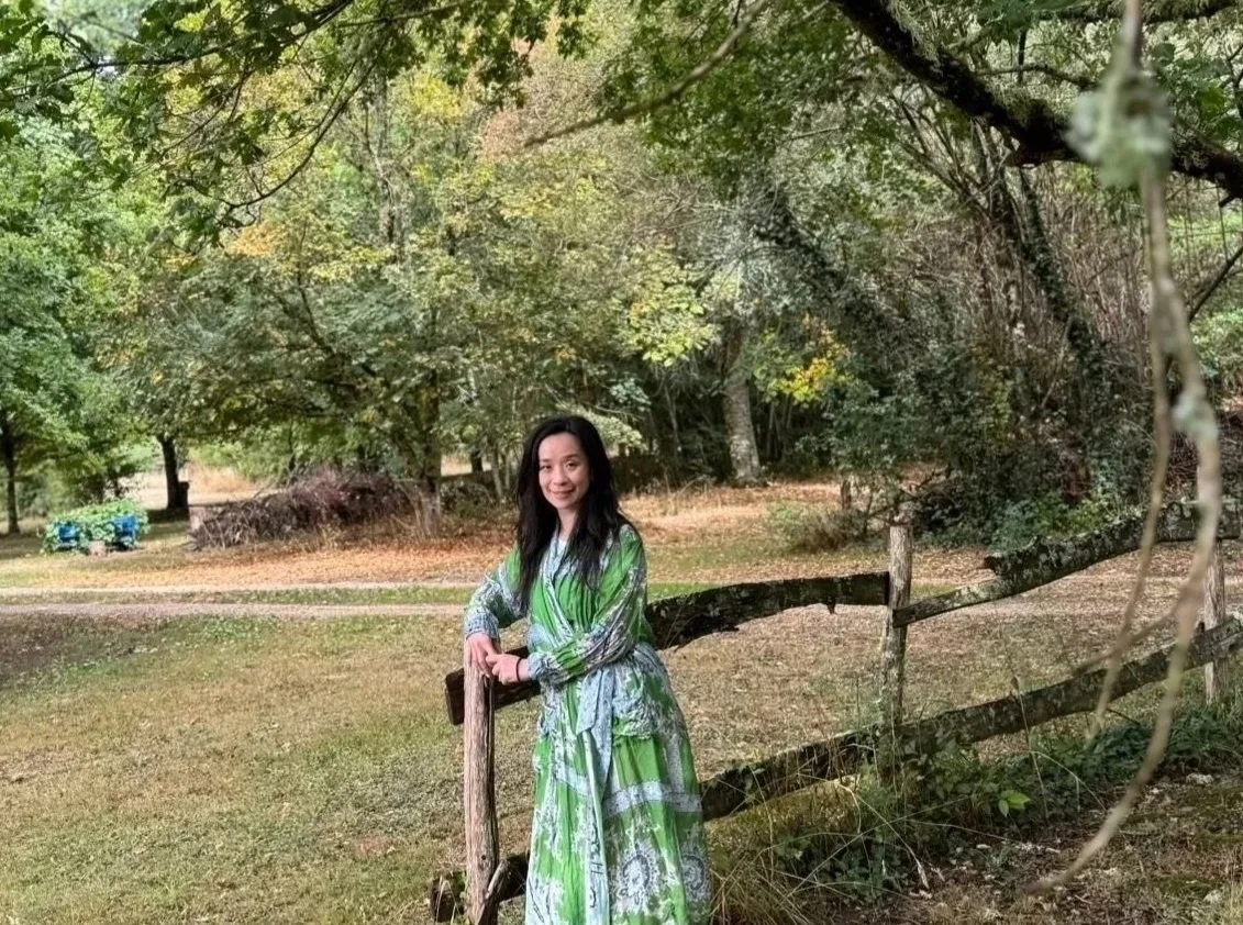 Li Lamb offering hypnotherapy and NLP in Ilkley, photographed in a peaceful woodland setting.