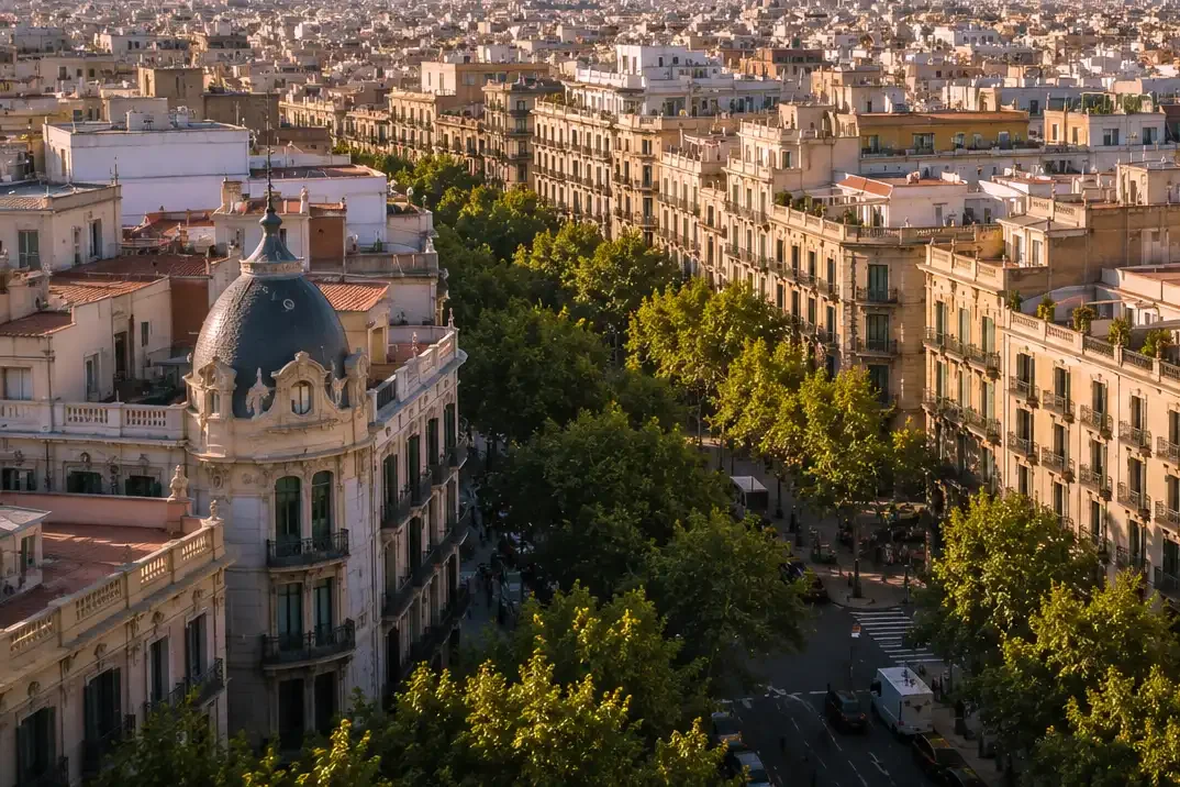 Panoramic view across Barcelona’s residential neighbourhoods and Eixample architecture towards the city skyline.