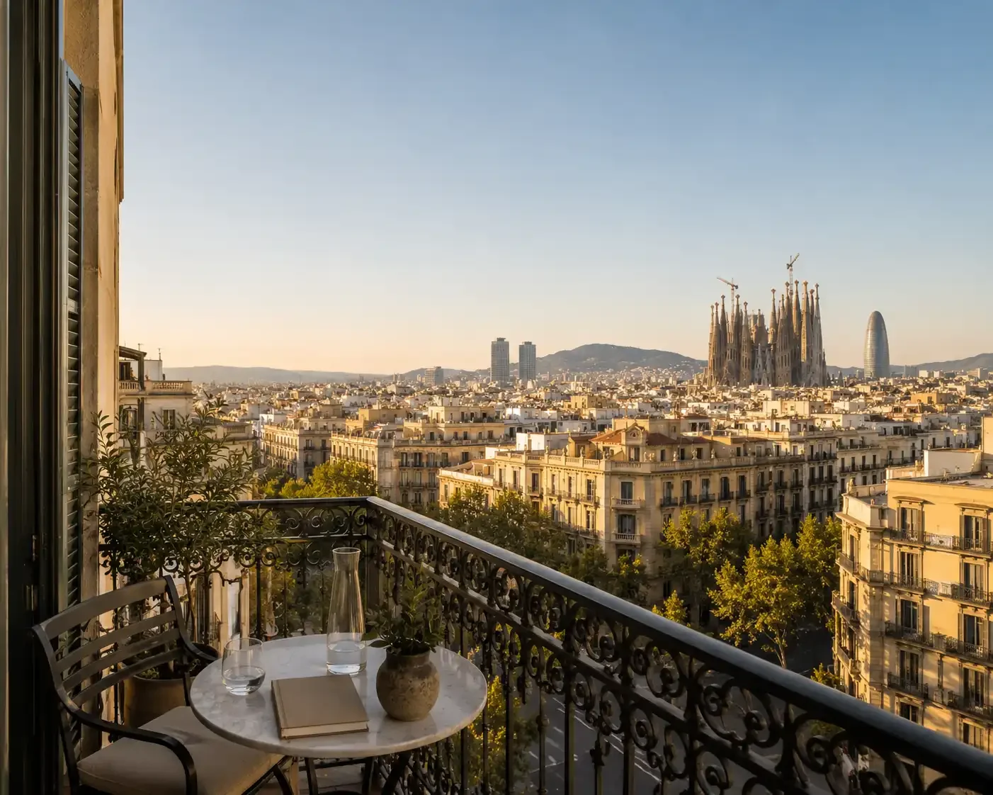 Elegant balcony overlooking Barcelona's skyline, representing the dream of buying an apartment in Barcelona from abroad.