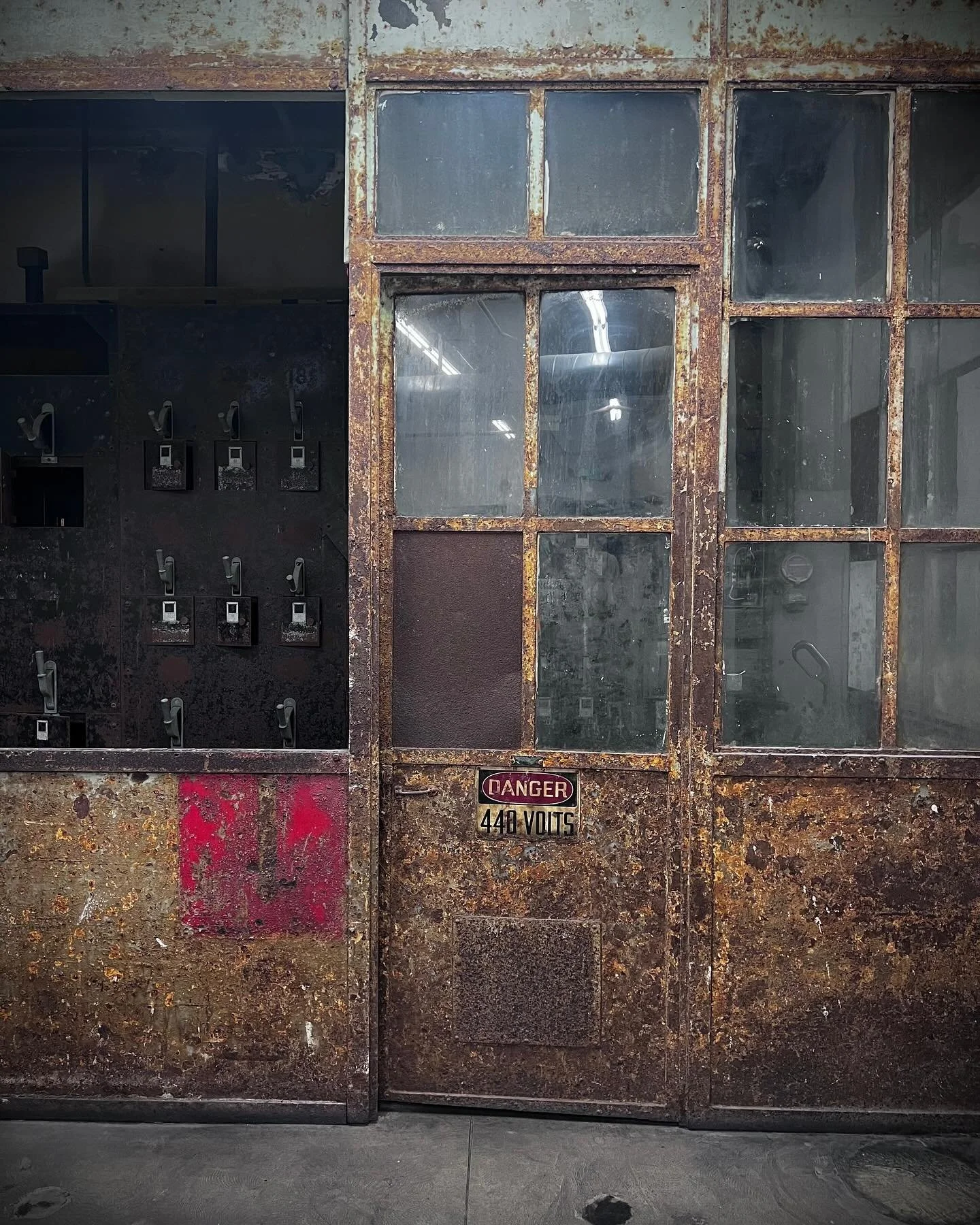 448 Watts&nbsp;a number, a marker, a whisper of stored energy humming behind locked doors. in the quiet recesses of Hauser + Wirth, past the deliberate and the curated, we found it: an old electrical panel room, walls thick with time, layered in deca