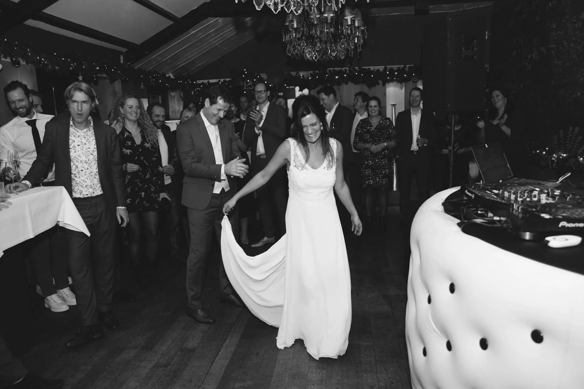 Bride and groom dancing together at their winter wedding in The Hague