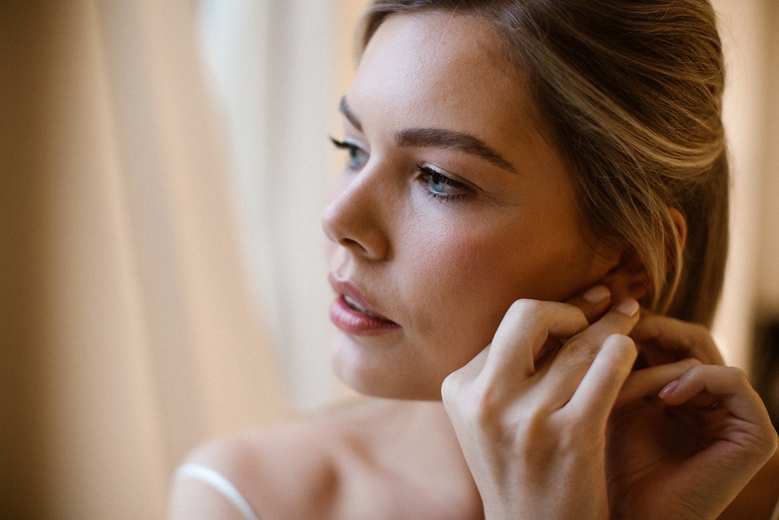 Elegant winter bride accessories at Waldorf Astoria Amsterdam for a luxury destination wedding.