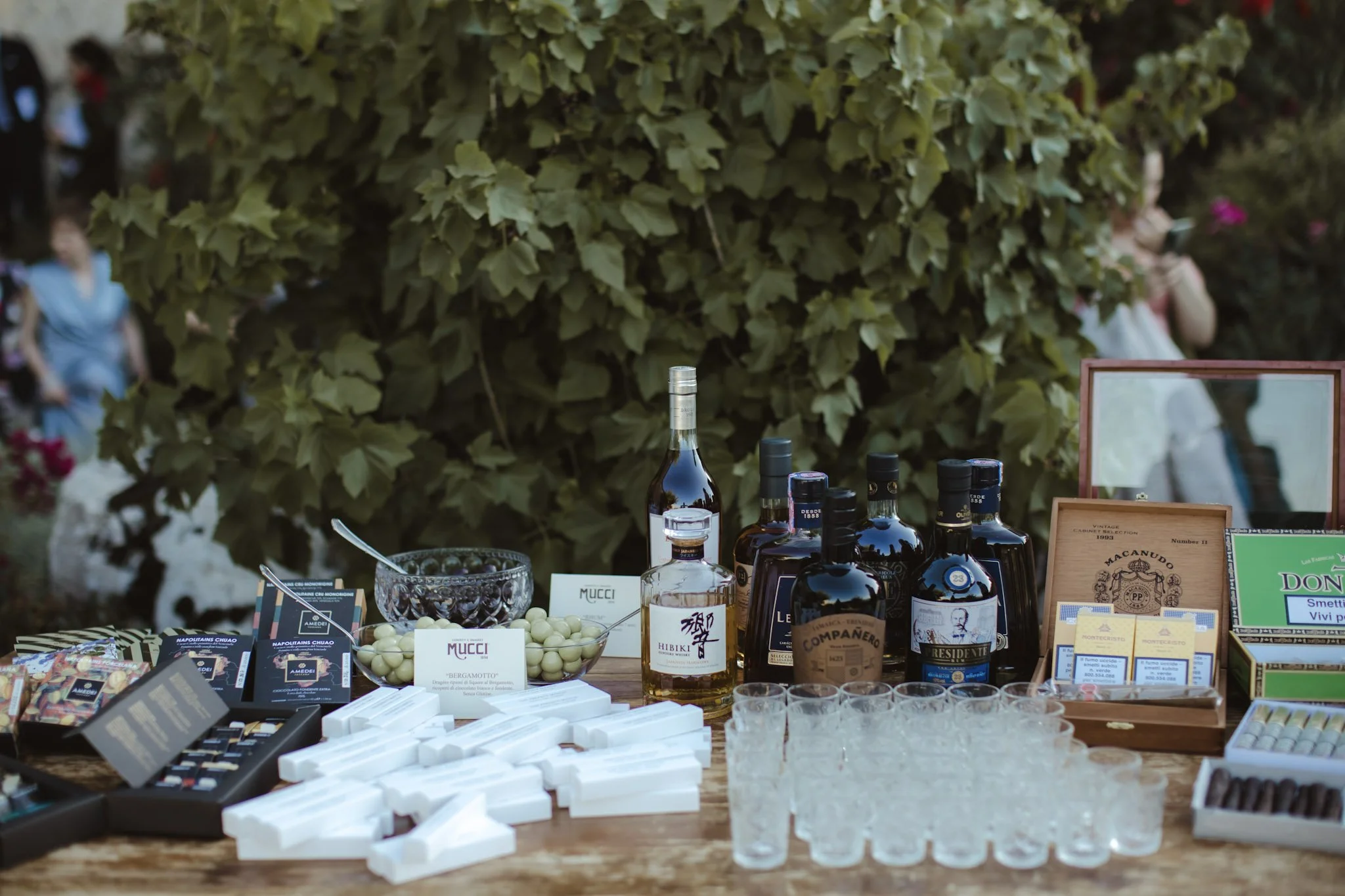 Sophisticated cigar table setup at a luxury wedding reception in Italy.