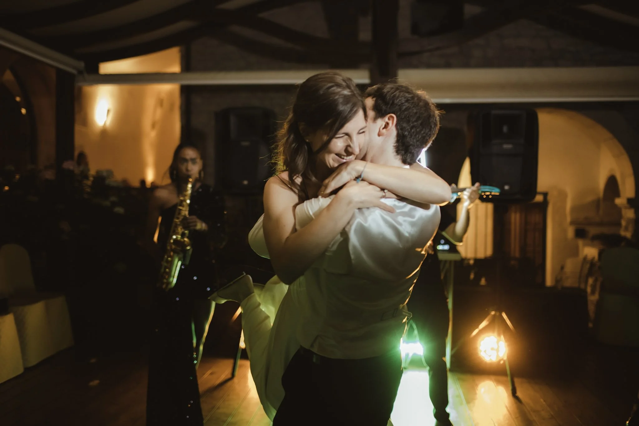 Bride and groom sharing their first dance at a destination wedding in Italy.