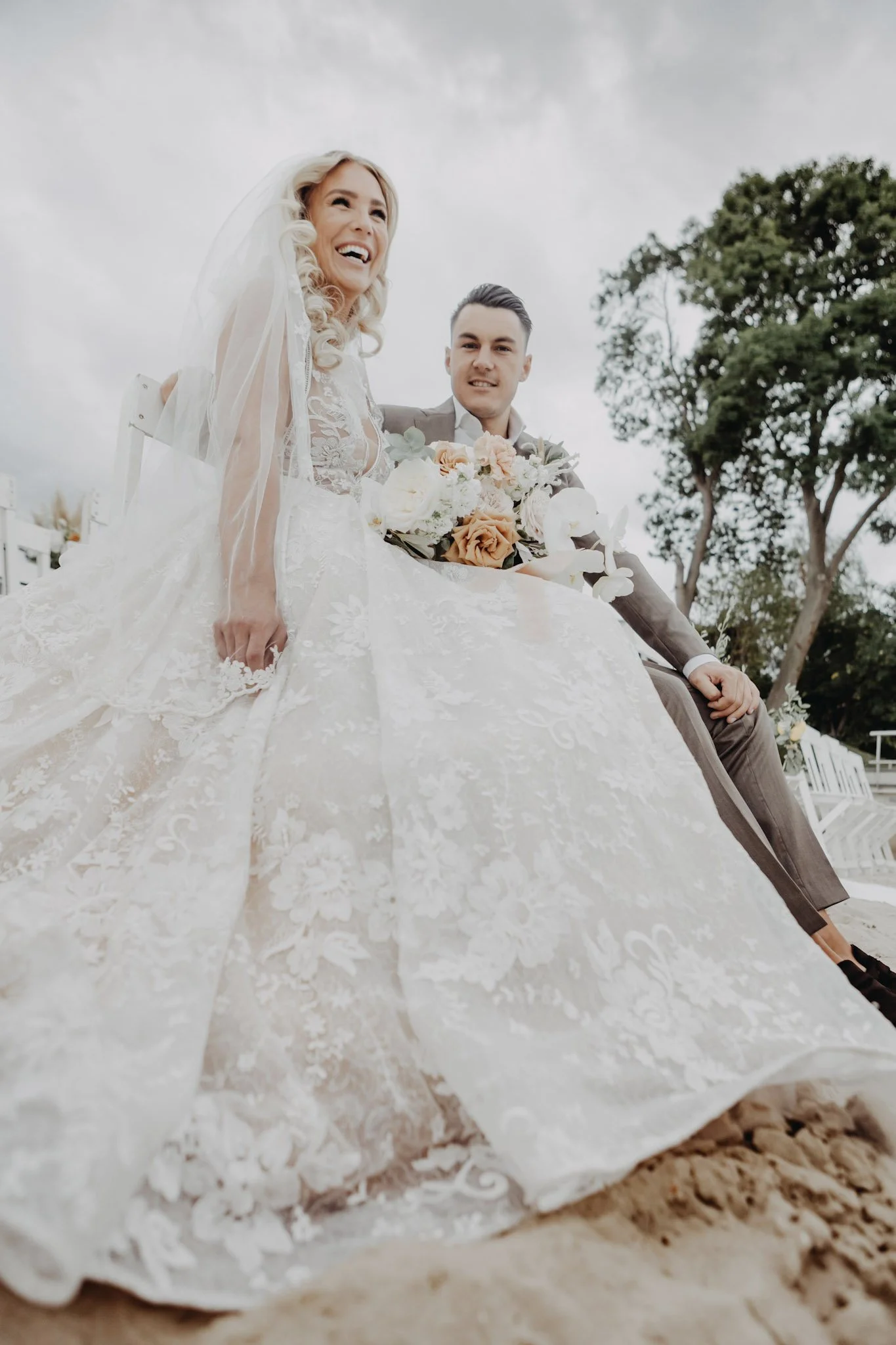 Couple during their beach wedding ceremony at a luxury destination in the Netherlands