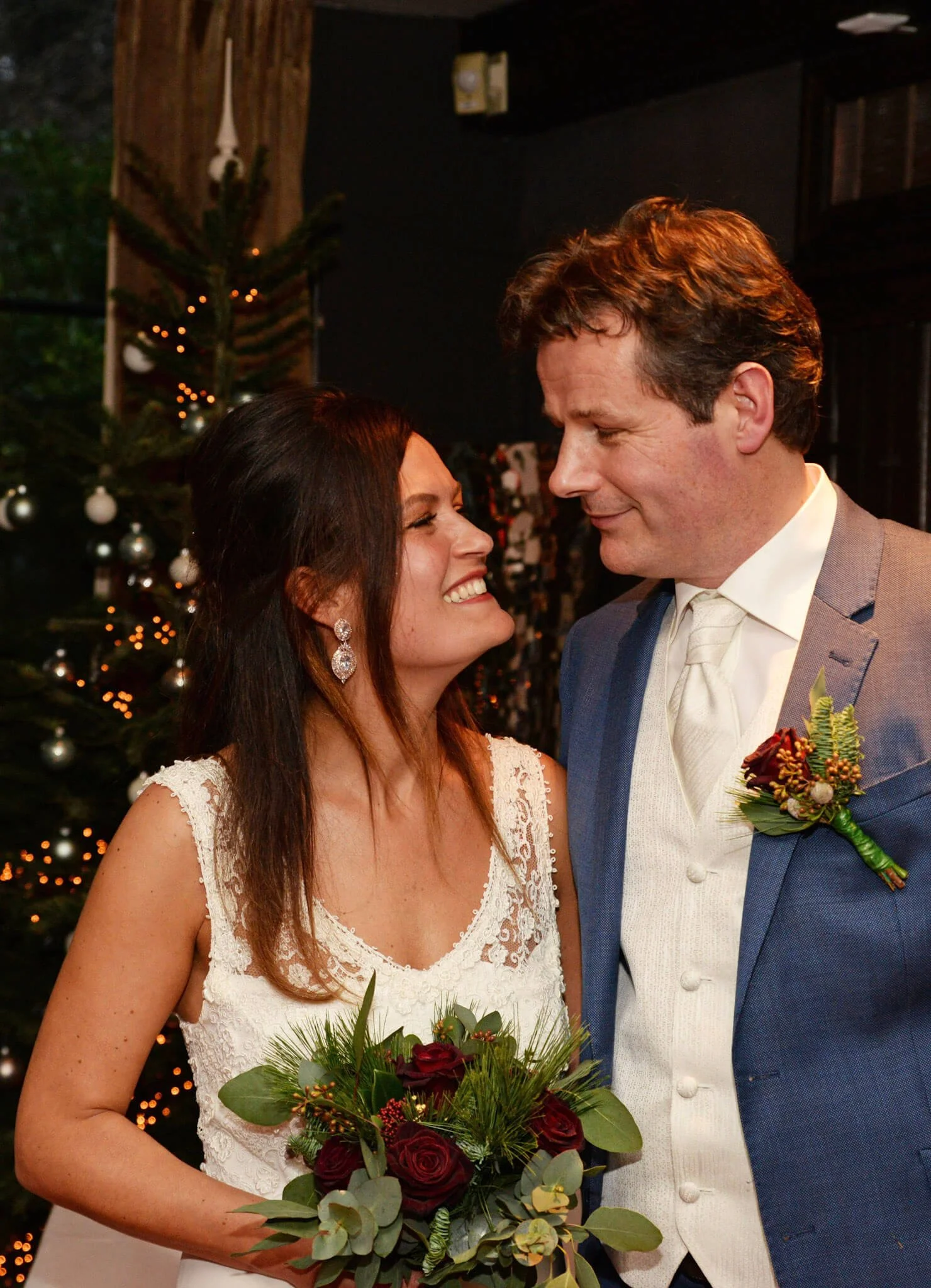 Bride and groom posing together during a winter wedding in The Hague