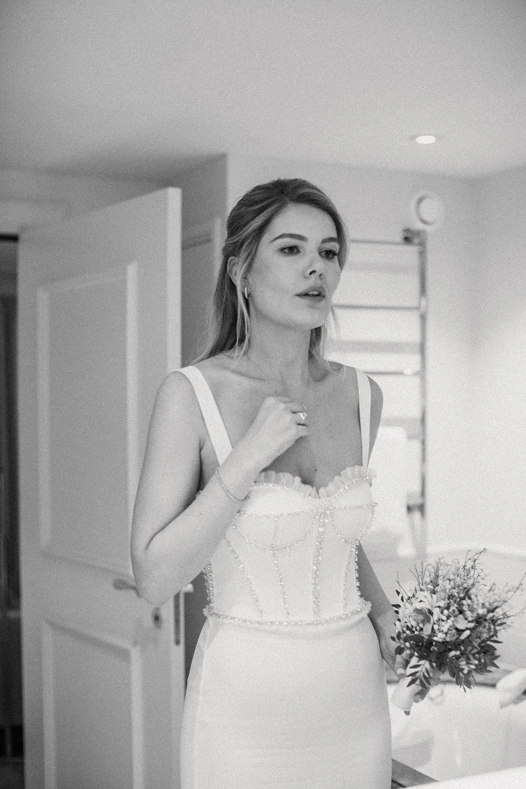 Evening bridal glam transformation captured at Waldorf Astoria Amsterdam during a winter wedding.