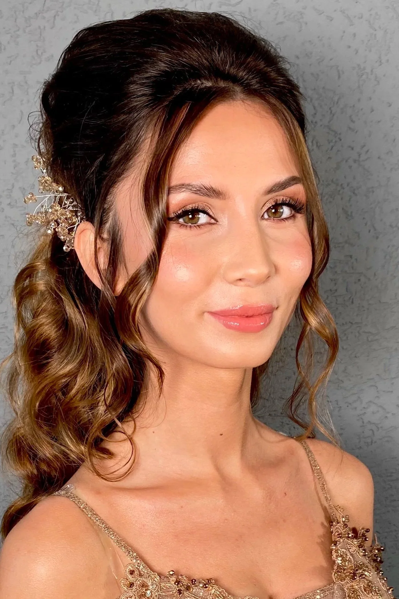 Bride from Kosovo wearing makeup for her engagement celebration