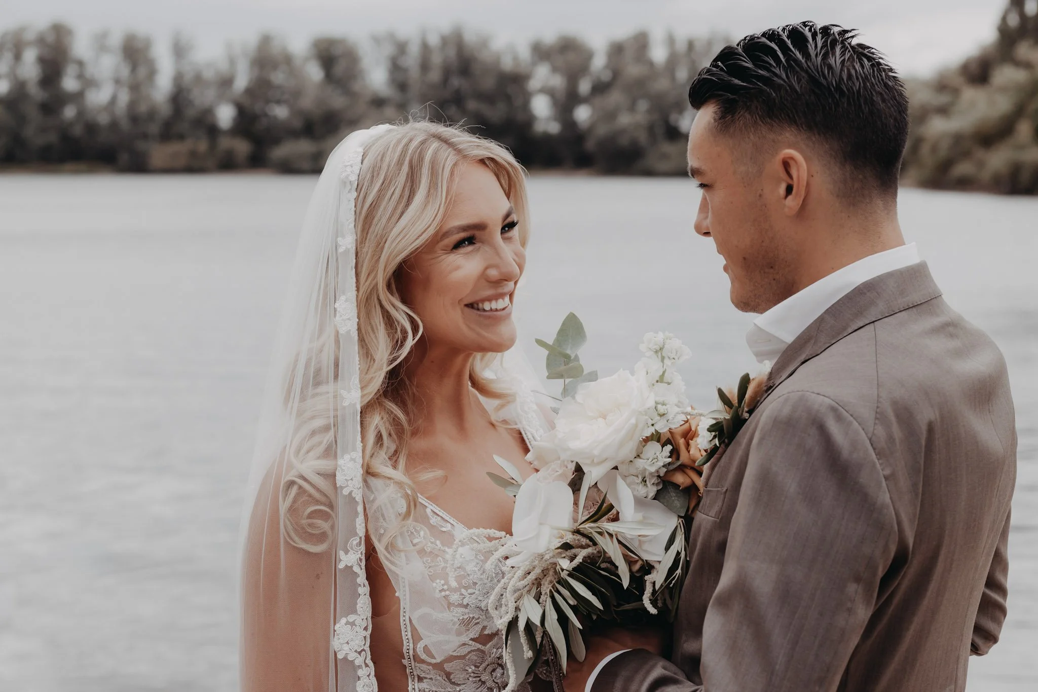 Wedding couple captured in an elegant portrait in Kerkdriel, the Netherlands.