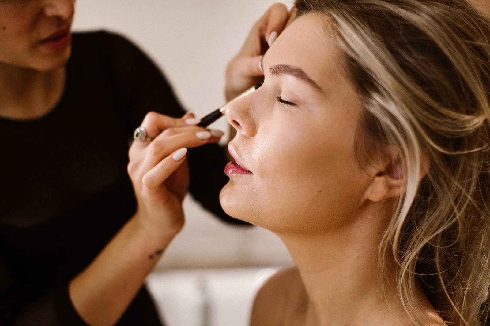 Soft romantic beauty look for welcome dinner during a luxury winter destination wedding in Amsterdam.