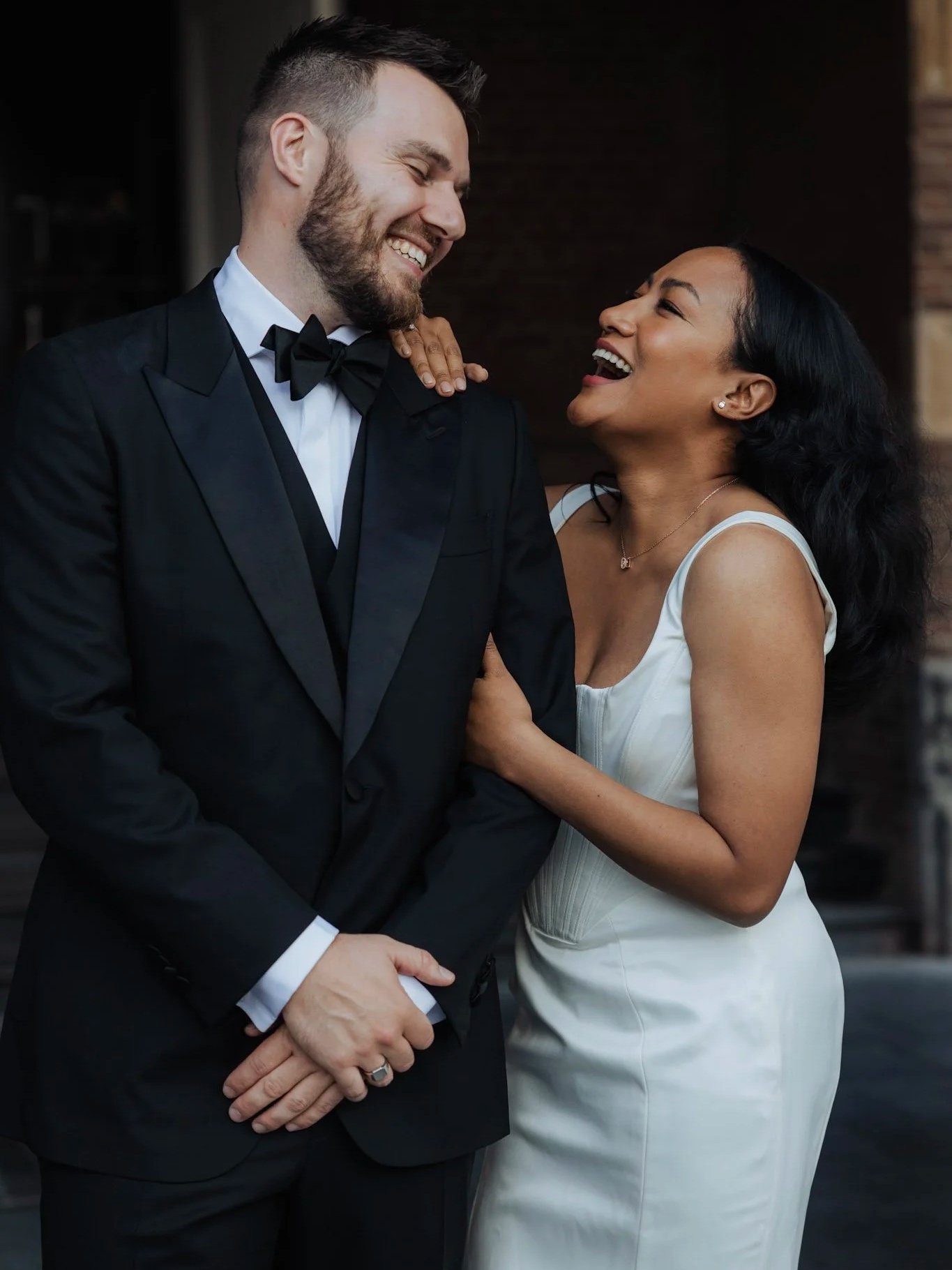 Multicultural wedding couple posing together in Hoorn