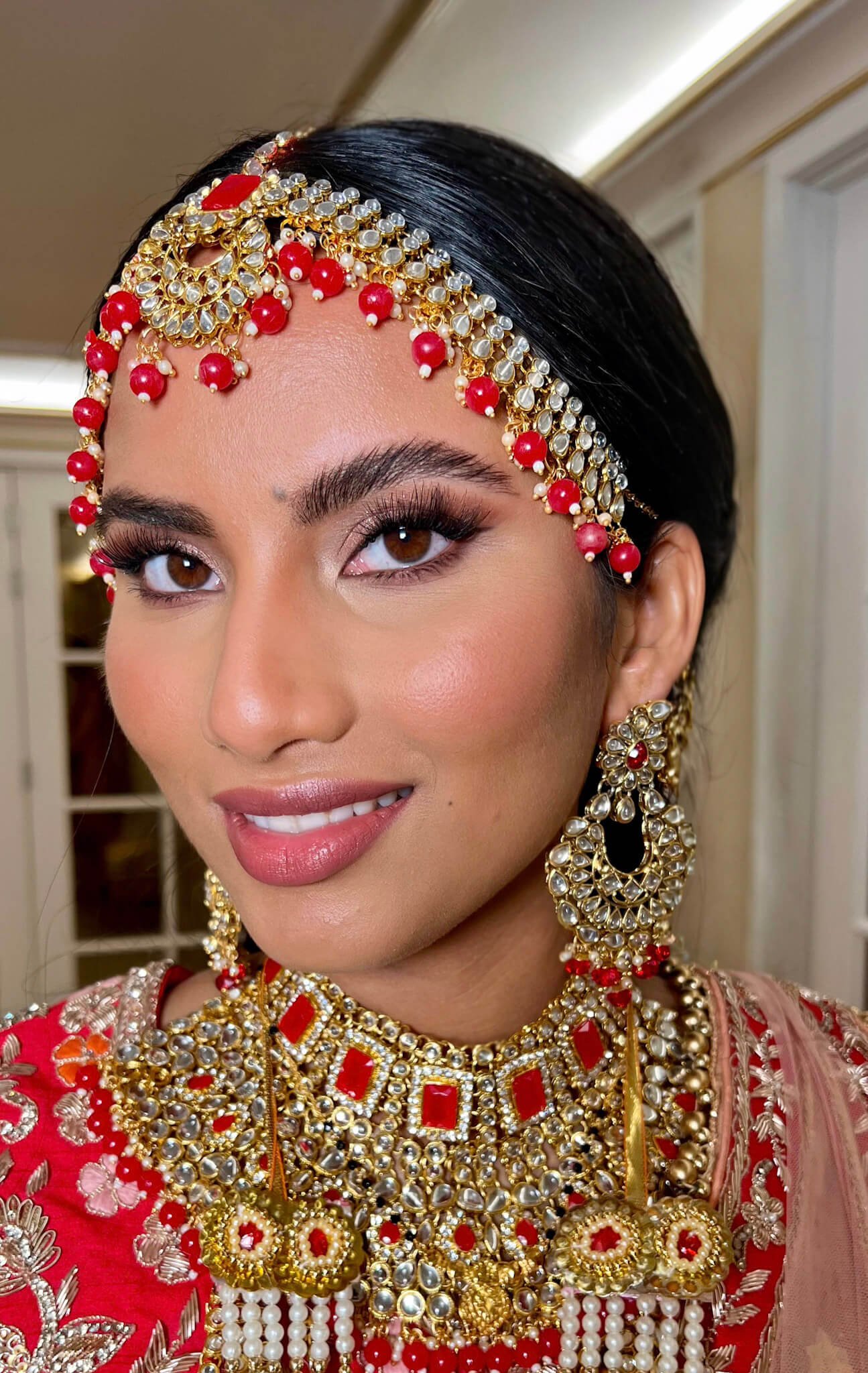 Modern Indian wedding bridal makeup look created for a luxury wedding in Rotterdam.