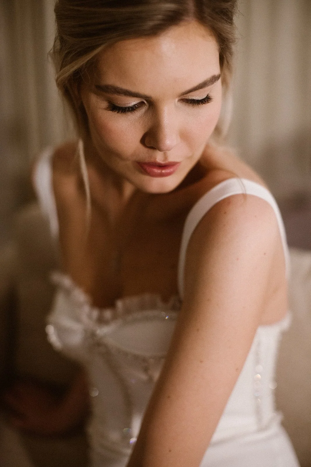Bride wearing her second makeup and hairstyle look for an elegant winter wedding in Amsterdam.