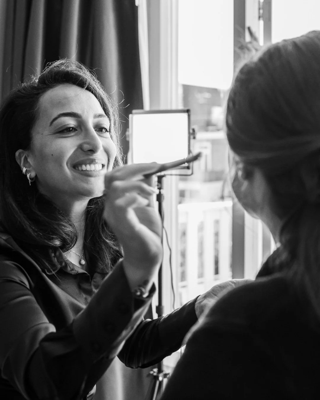 bride getting ready makeup touch ups