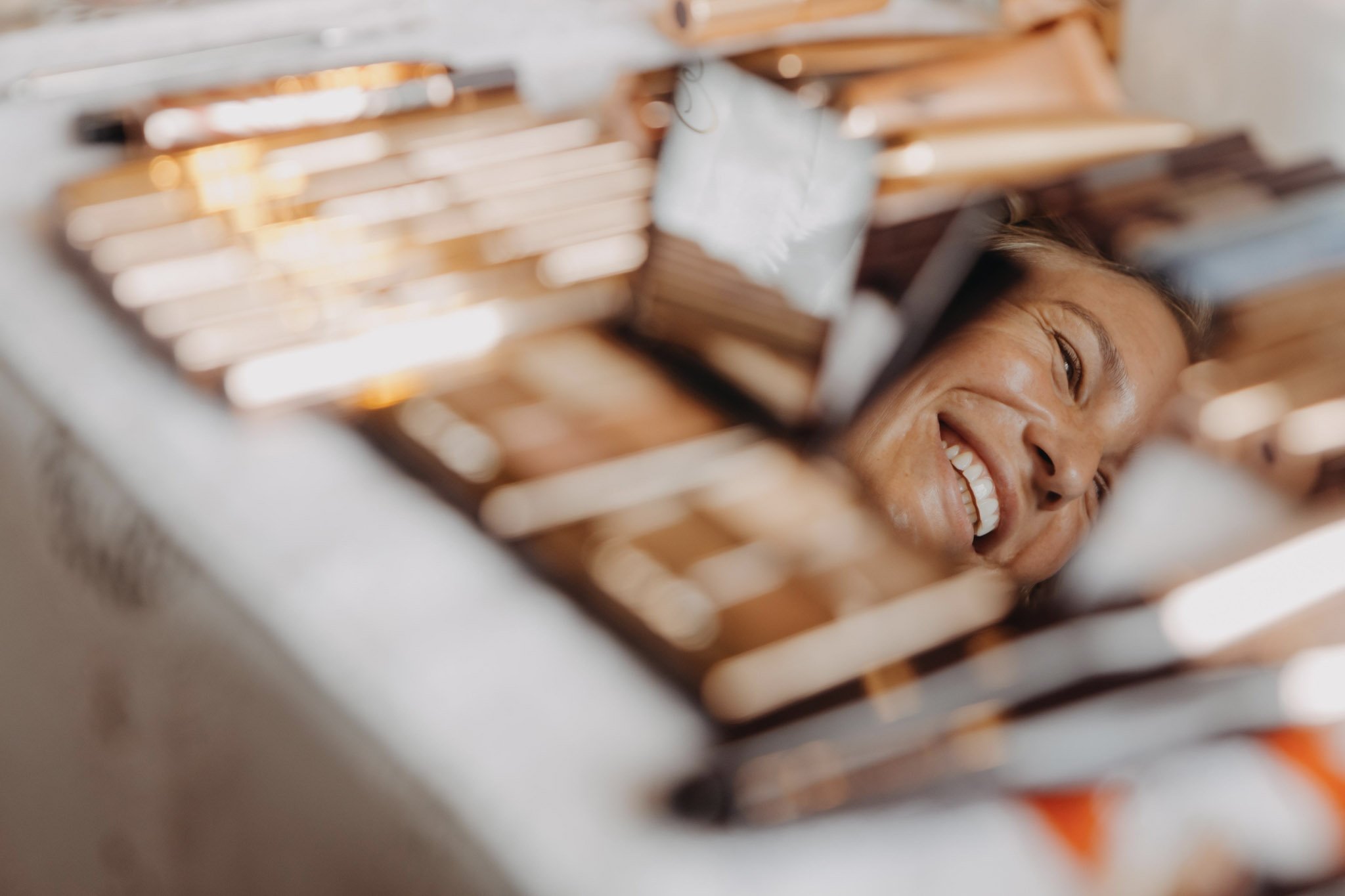 Mirror reflection of the bride getting ready for her luxury wedding in the Netherlands.