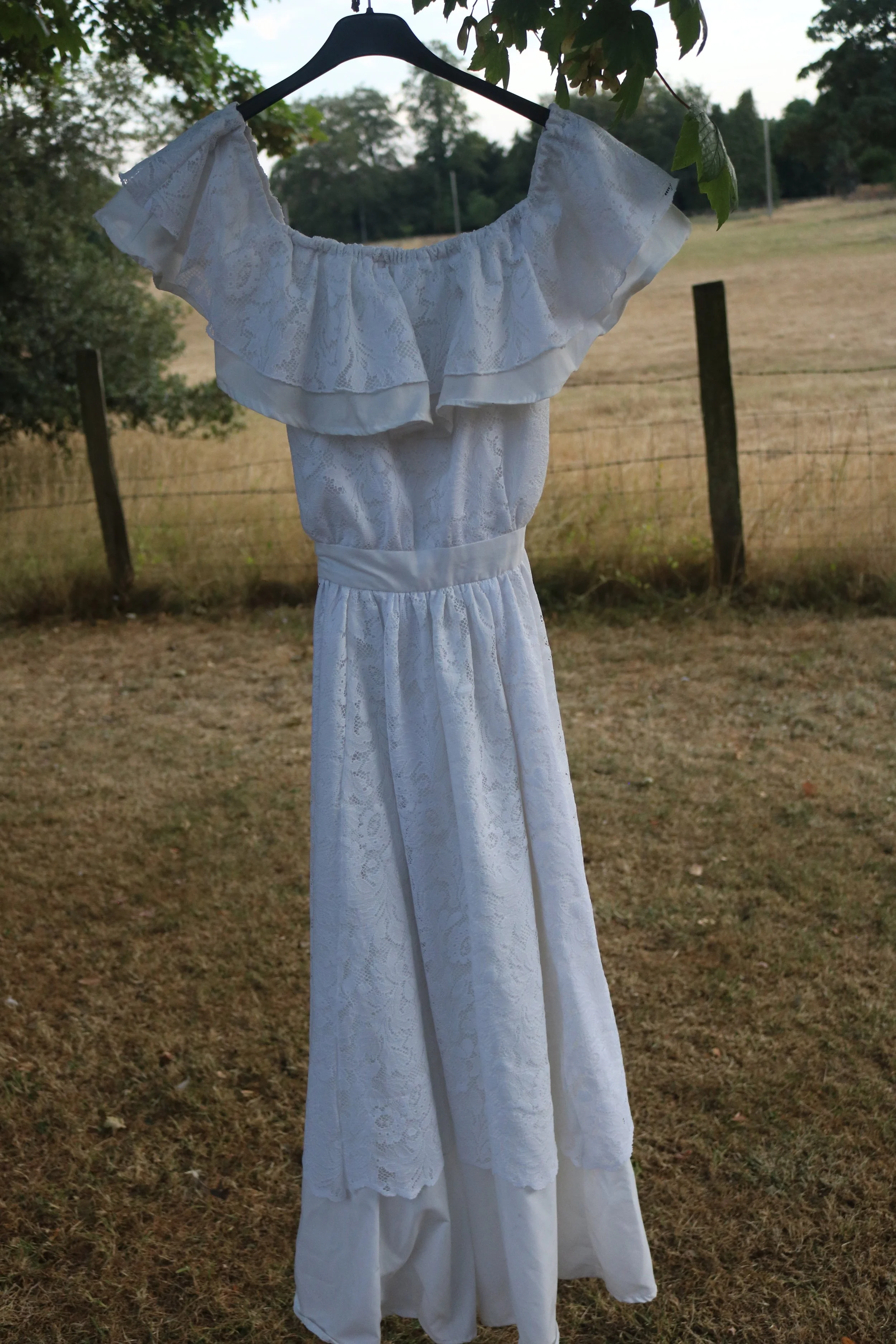 Jessi dress , made from secondhand bedsheets and a vintage net curtain.
