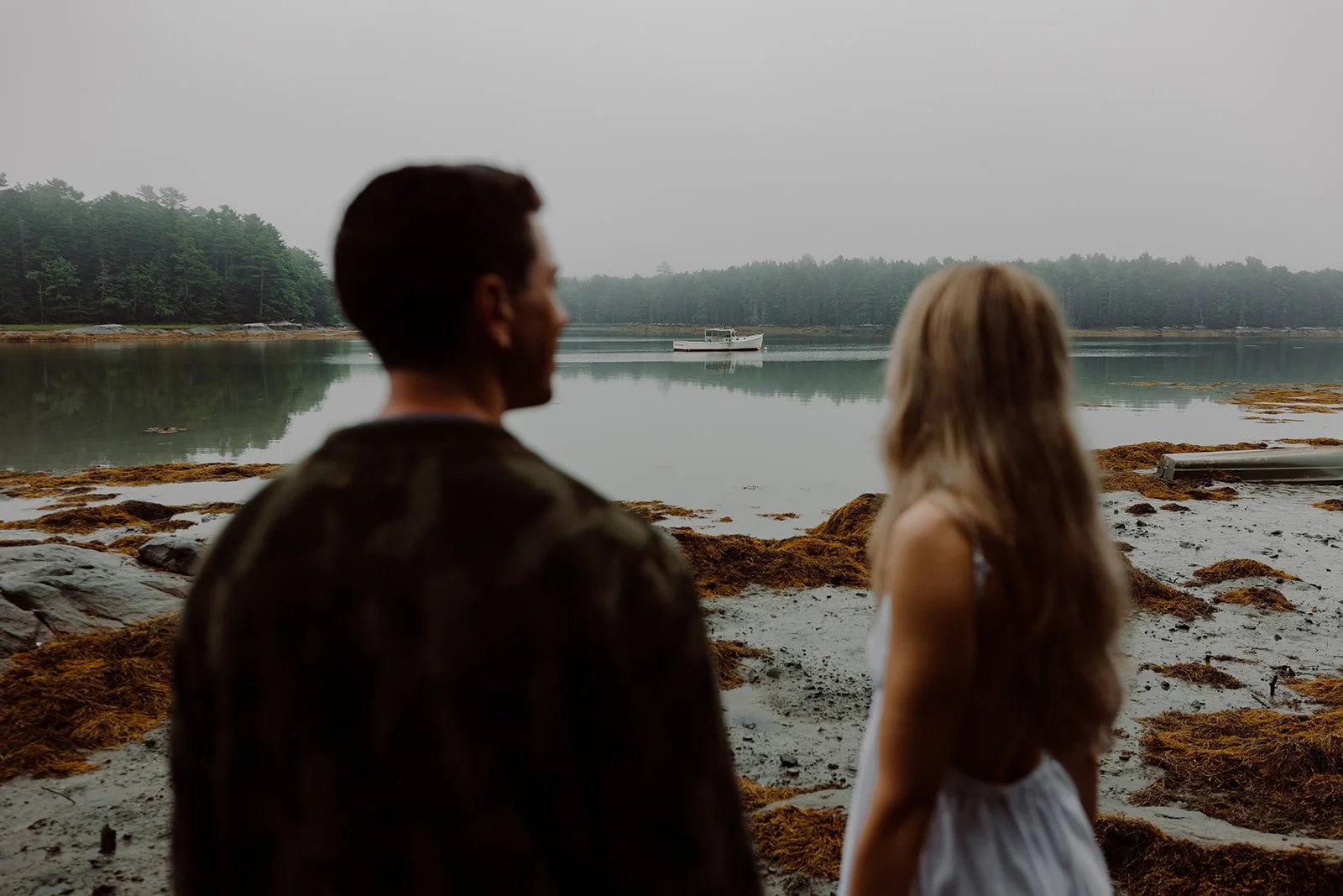 couple read vows in the morning of their wedding at tops'l farm in Maine