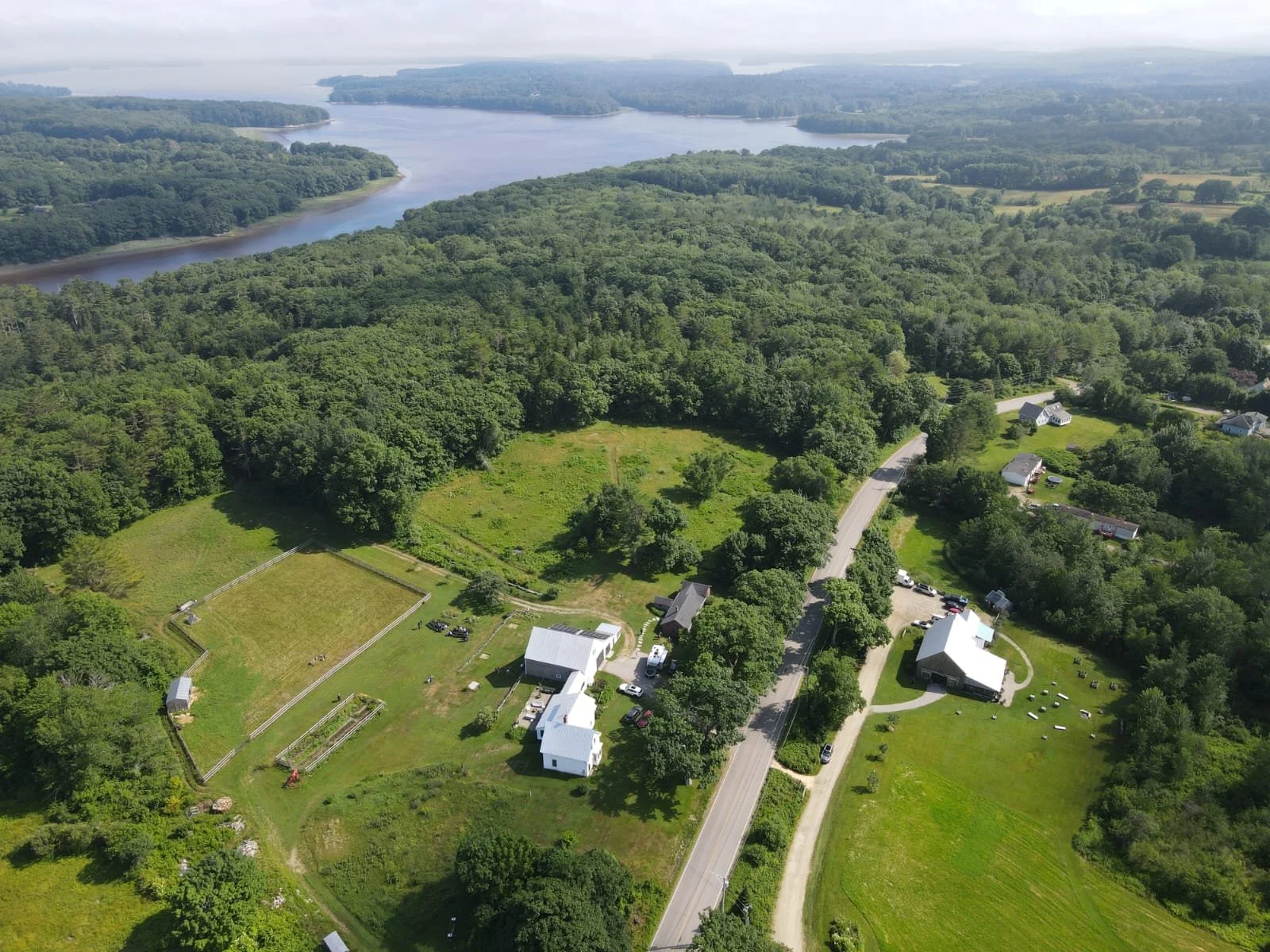 An aerial photo of the tops'l farm wedding venue showing off the expansive area for hosting a weekend celebration