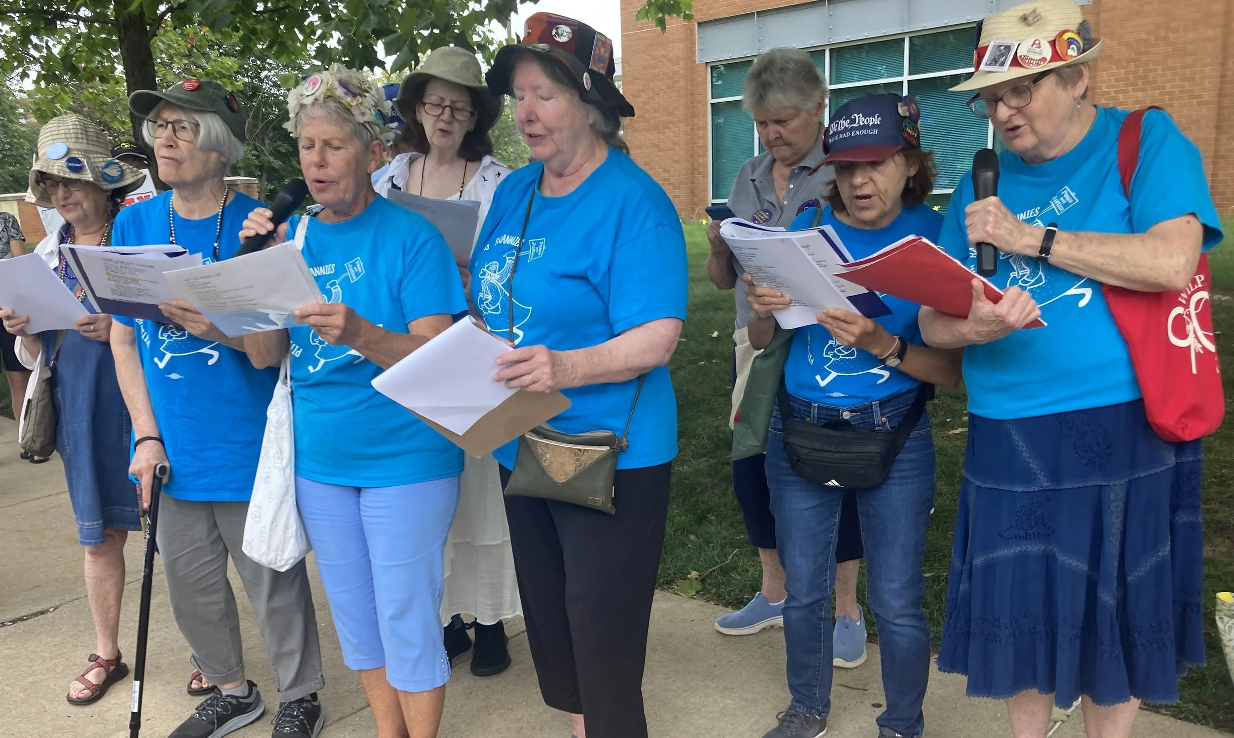 Ice vigil at microphone July 2026.jpeg