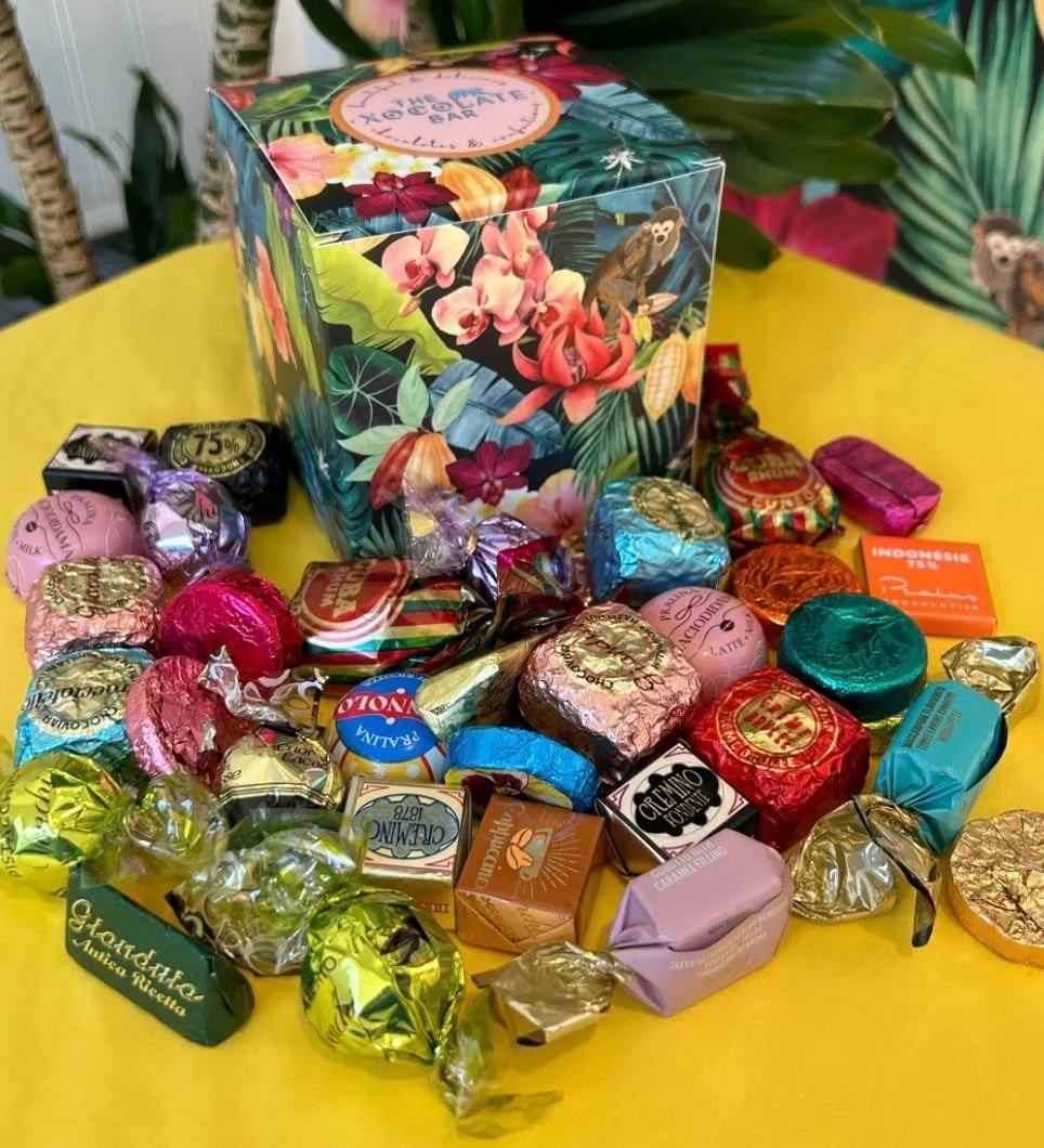Chocolates by the Pound for your Valentine! Beautiful and delicious chocolates in a variety of flavors and colors served in bulk. A classy gift that's easy to share since each piece is individually foil wrapped. Most of these contain hazelnut. All of