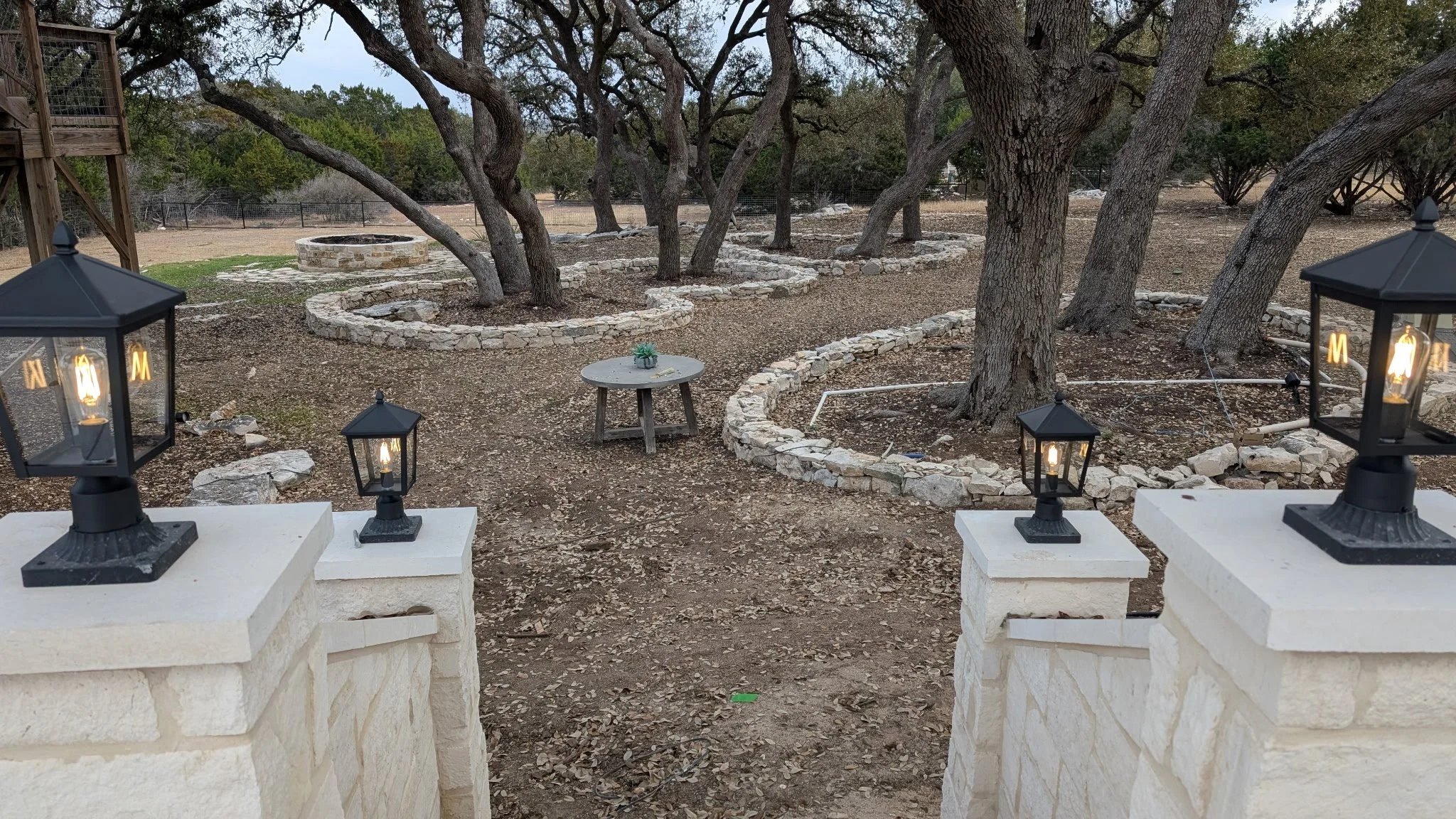 Exterior walkway lighting leading to a gravel path. Lighting installed by BP Electrical Services