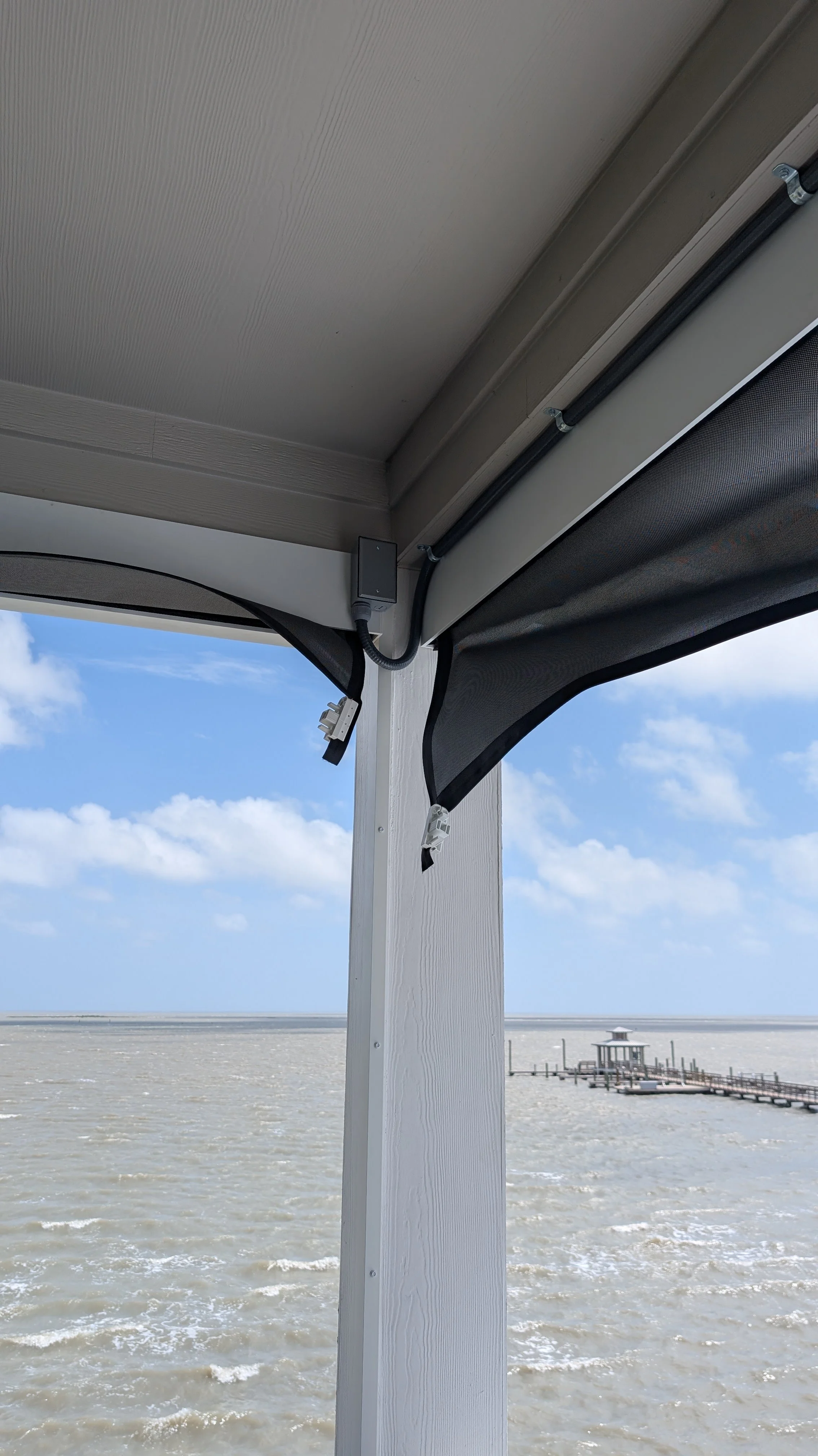 Waterfront porch with electrical wiring installed by BP Electrical Services