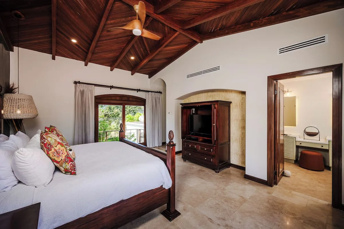 Master bedroom with smart television and central air
