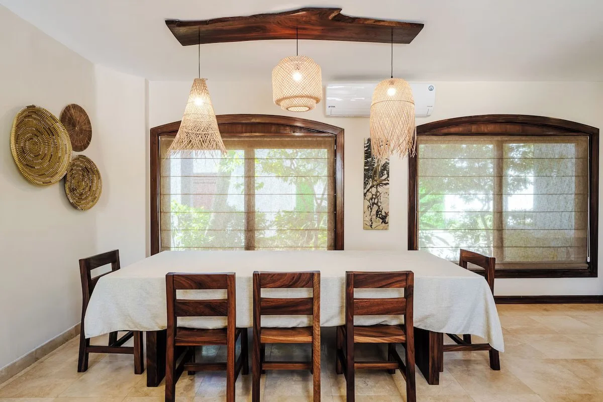 The dining table seats up to 8
